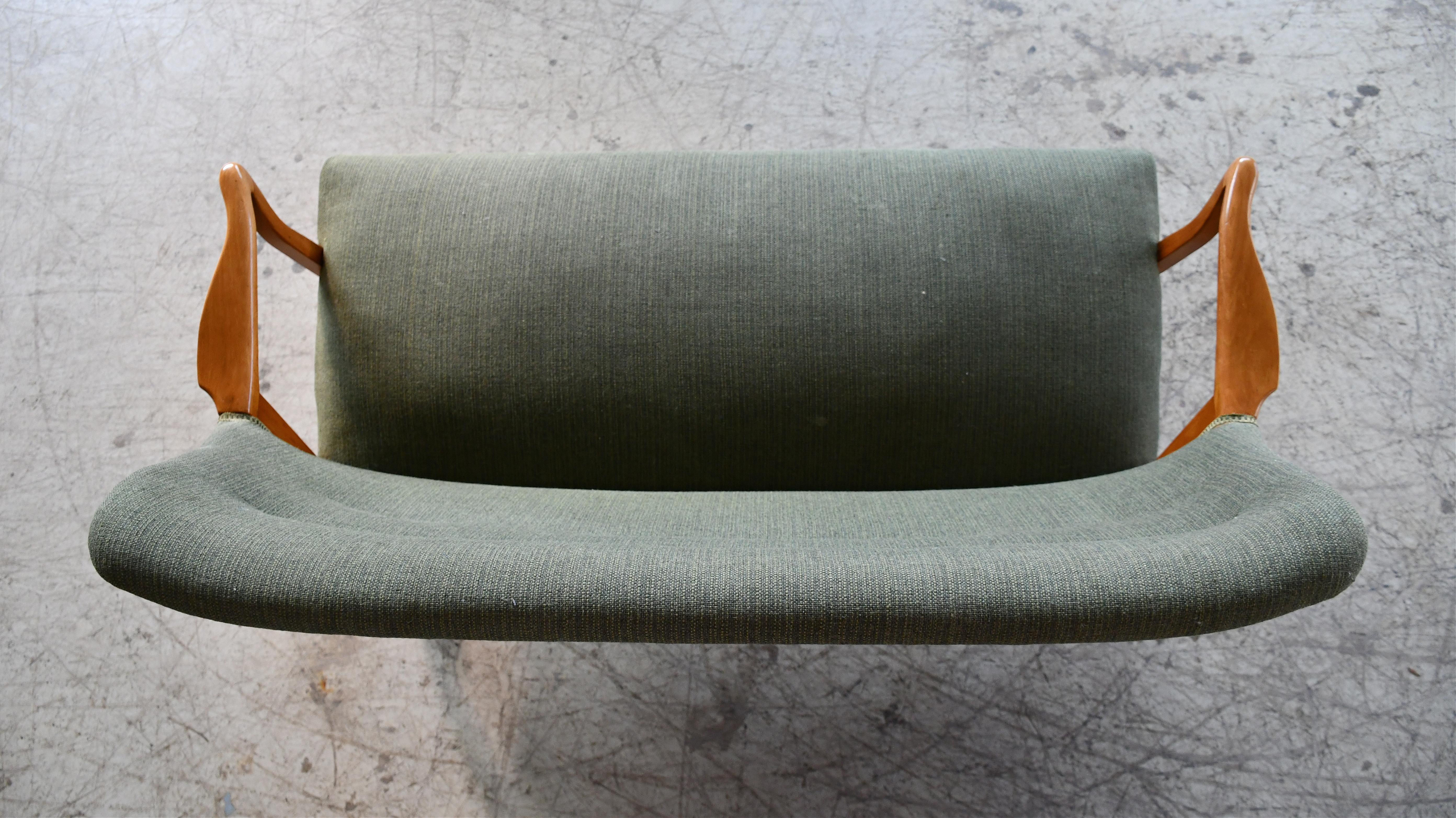 Mid-20th Century Swedish Loveseat or Settee with Open Wooden Armrests in Elm ca. 1950
