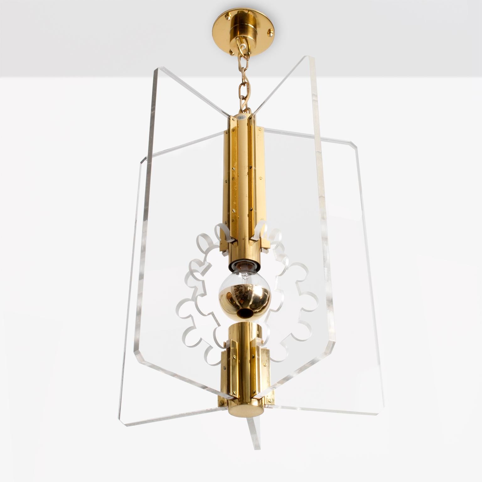 Swedish Mid-Century Modern polished brass pendant or lantern with five Lucite panels featuring a 