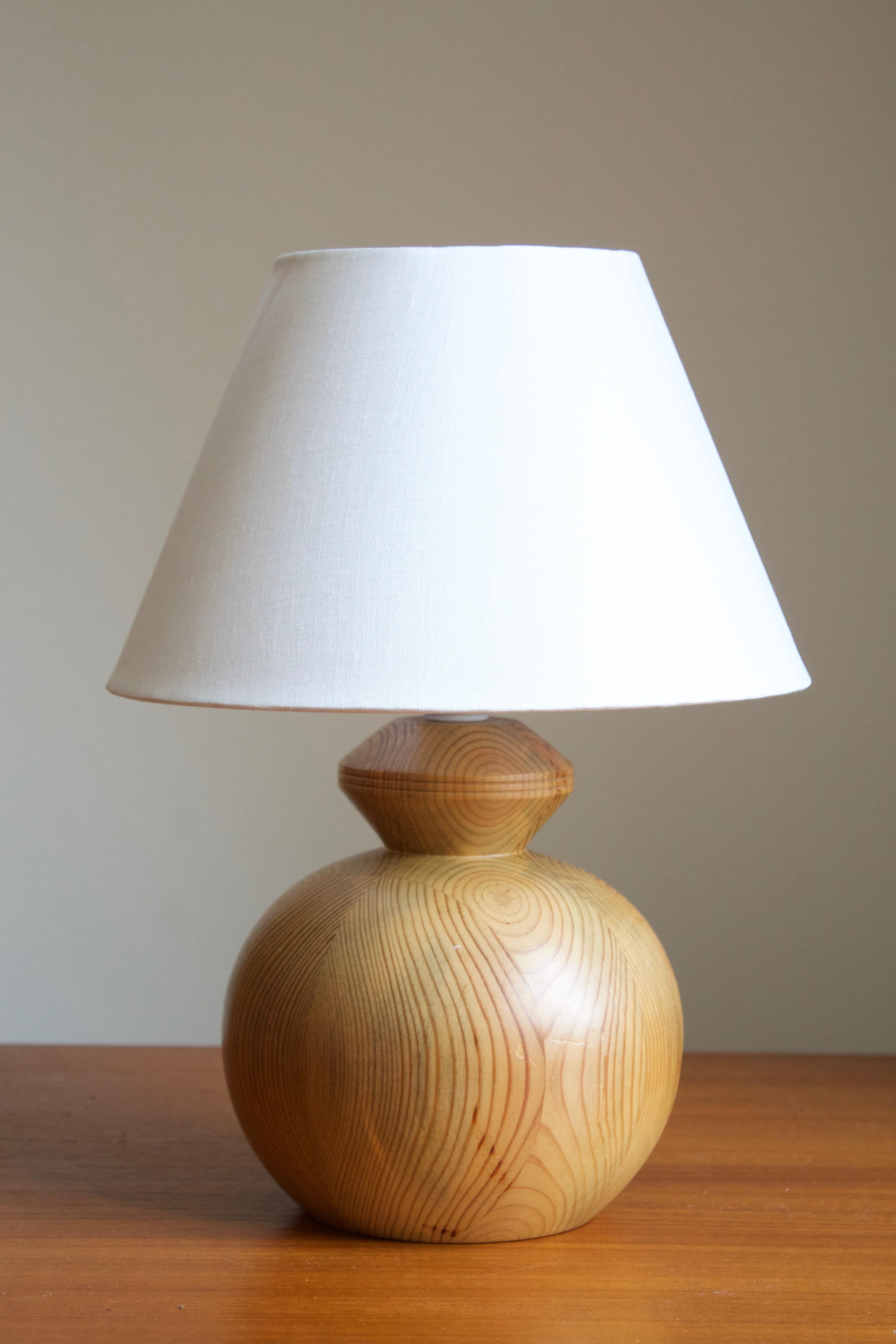 A table lamp. In solid pine. Signed NP and dated 1983.

Stated dimensions exclude lampshade, height includes socket. Sold without lampshade.