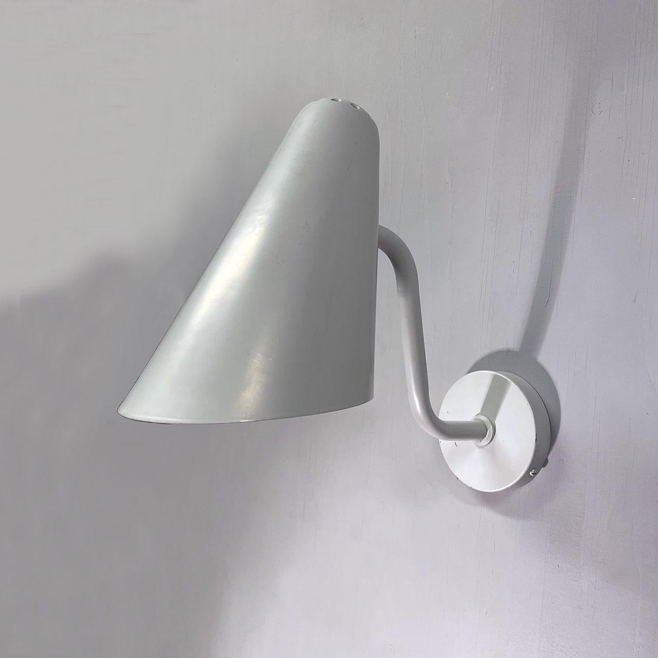 Wall lamp manufactured by Boréns at Borås in Sweden during the 1950s. Made from grey lacquered metal and aluminum. 