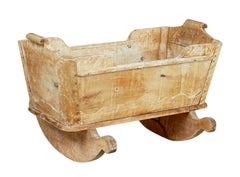 Swedish mid 19th century carved pine rocking cradle