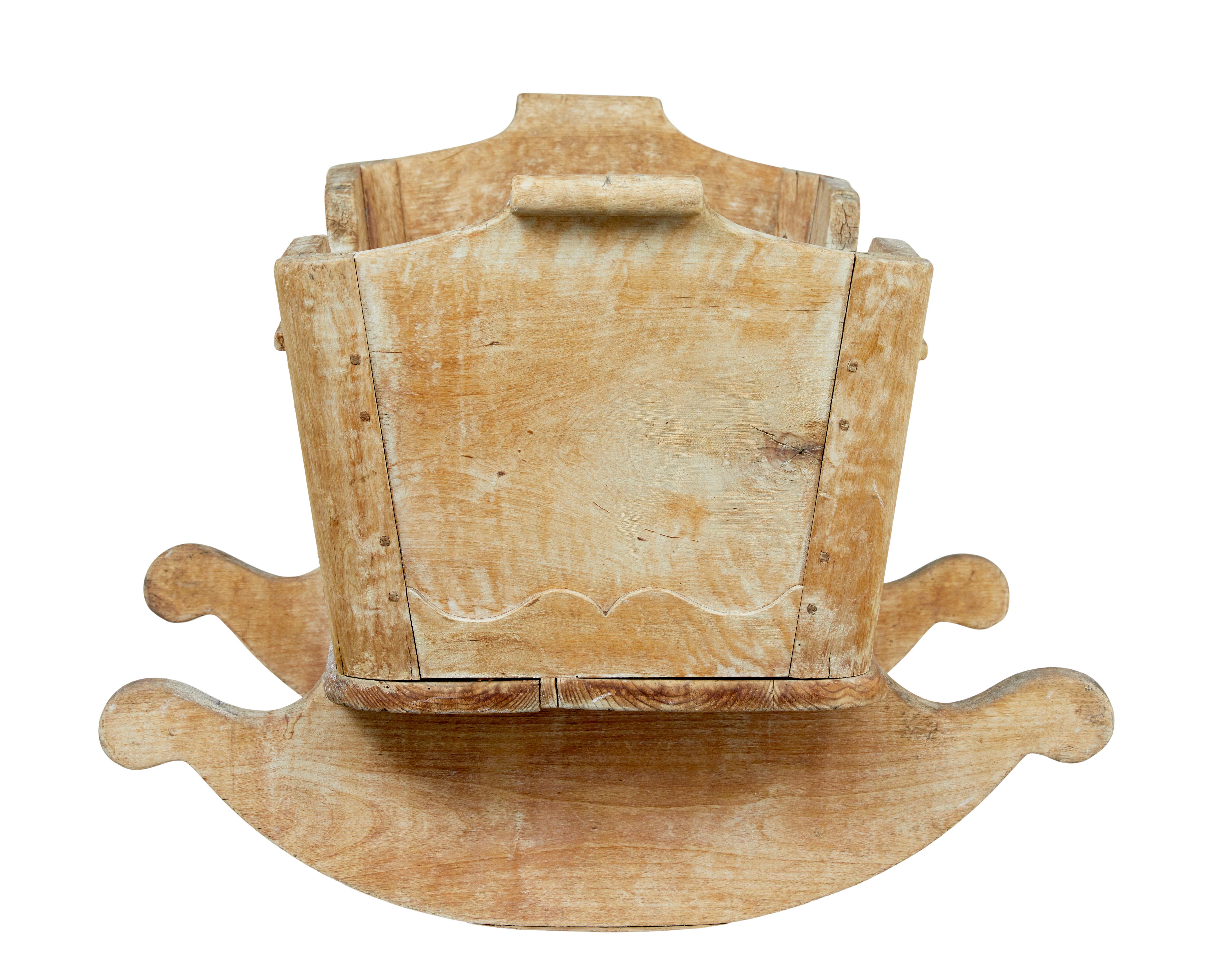 Carved Swedish mid 19th century carved pine rocking cradle For Sale