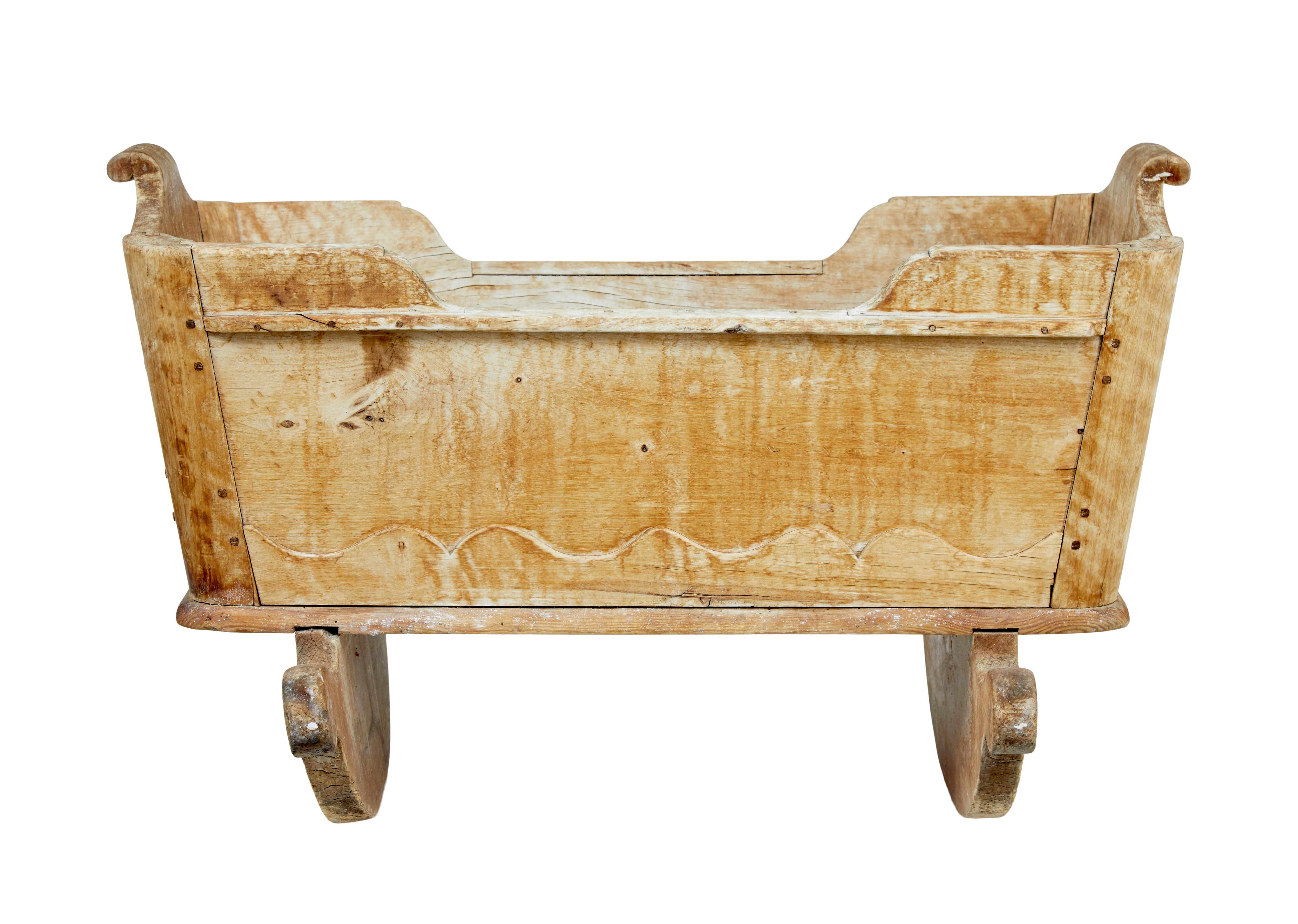 Pine Swedish mid 19th century carved pine rocking cradle For Sale