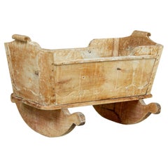 Swedish mid 19th century carved pine rocking cradle