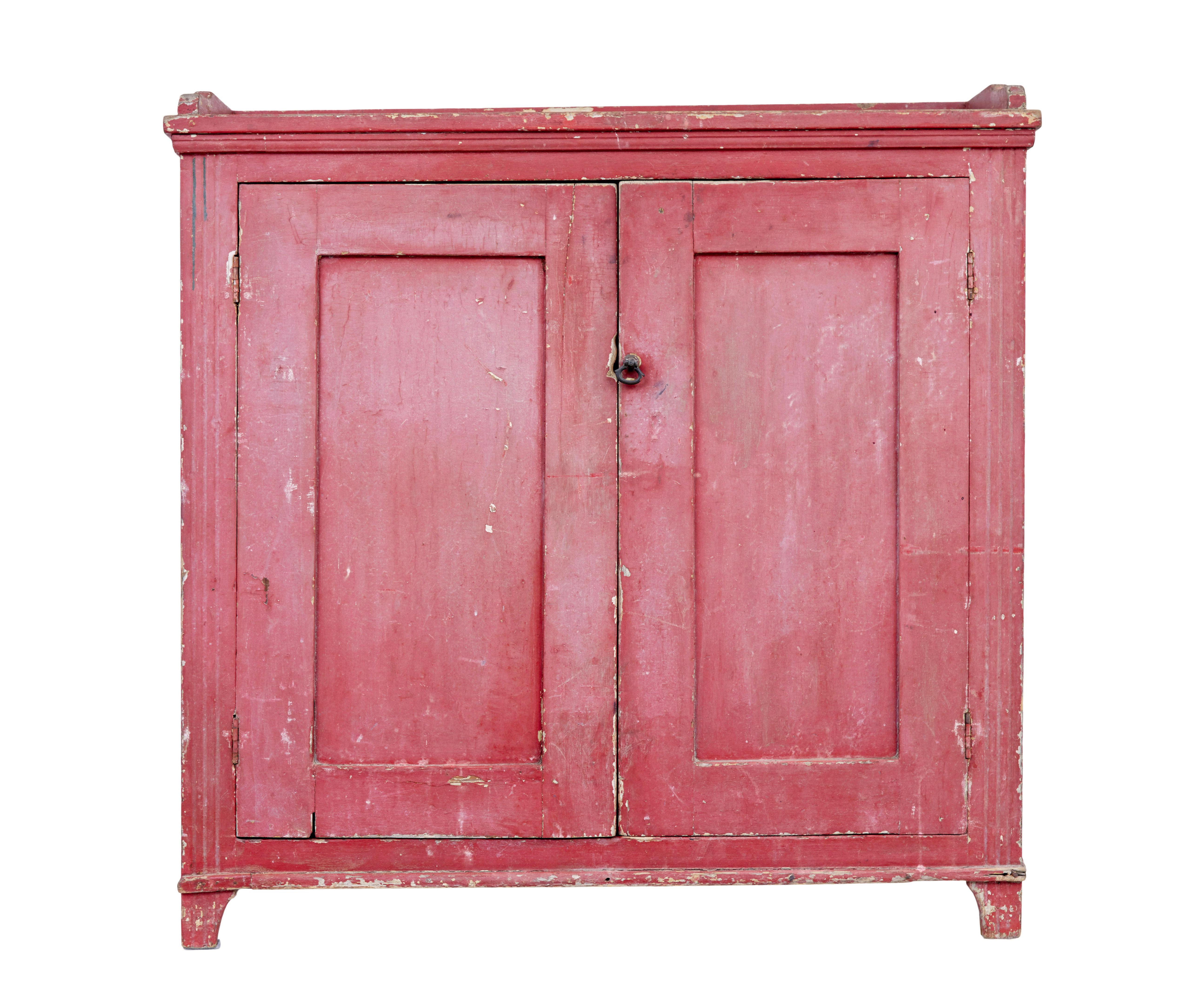 Swedish mid 19th century original paint cupboard circa 1850.

Striking kitchen cupboard offered in original condition.  Made in thick solid pine.  Original paint has taken on a lovely faded colour, if the piece was waxed/polished it returns to a