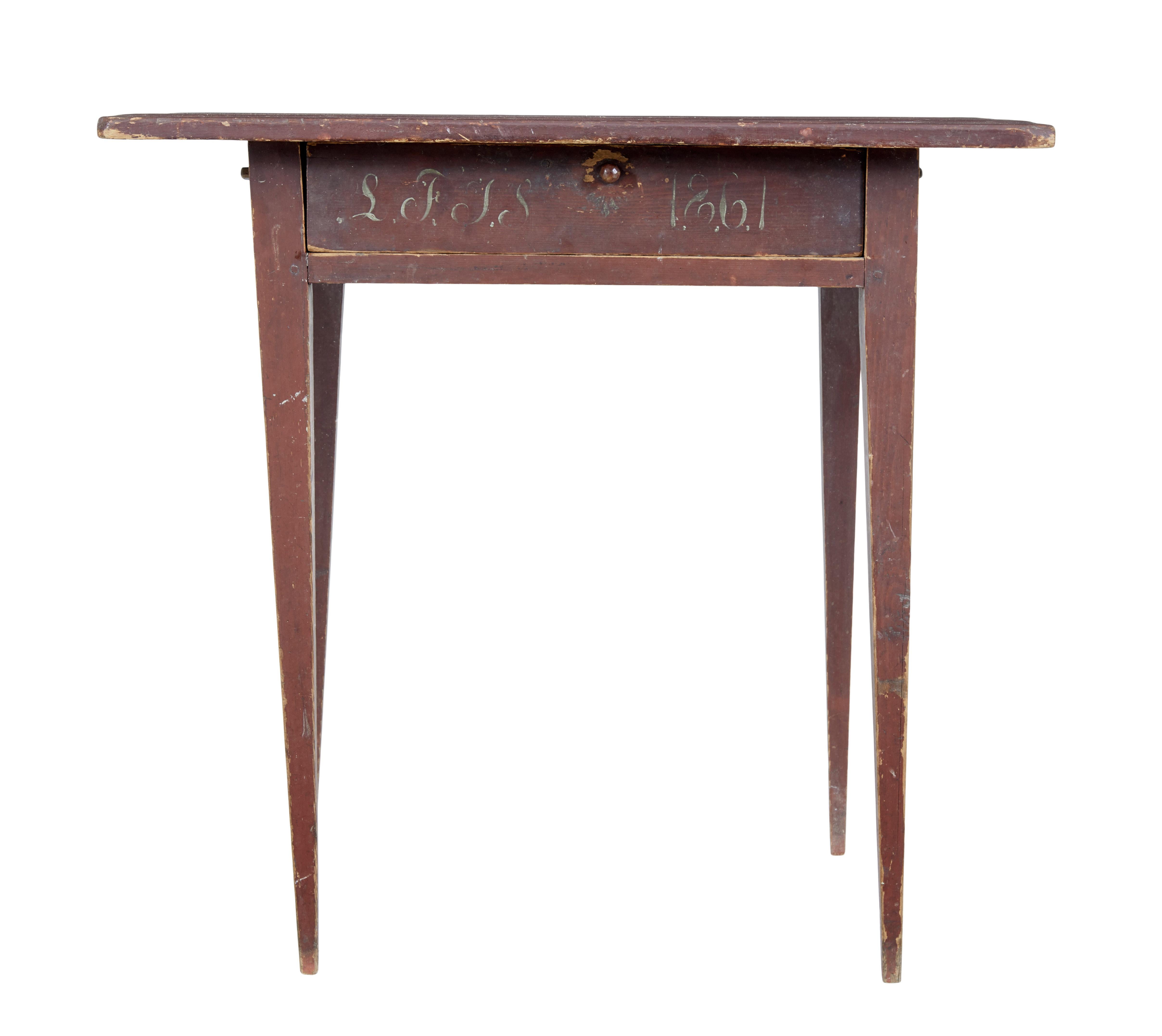 Swedish mid 19th century rustic painted pine side table circa 1861.

Real rustic traditional table we found on our travels around Sweden. Initialed l.F.J.S and dated 1861 on the drawer front.

Over-sailing rectangular top, with a single drawer