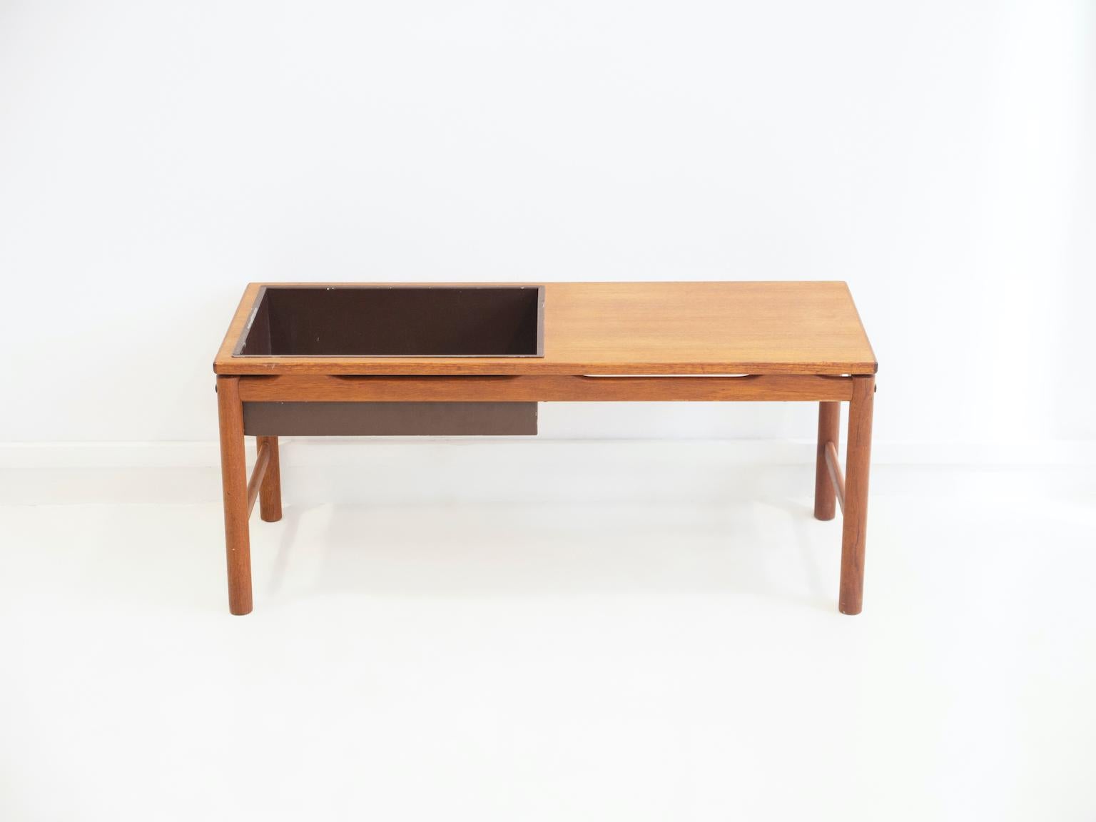 Teak wood flower table with dark brown painted metal box for plants. Made in Sweden by HMB Rövik Furniture in circa 1960.