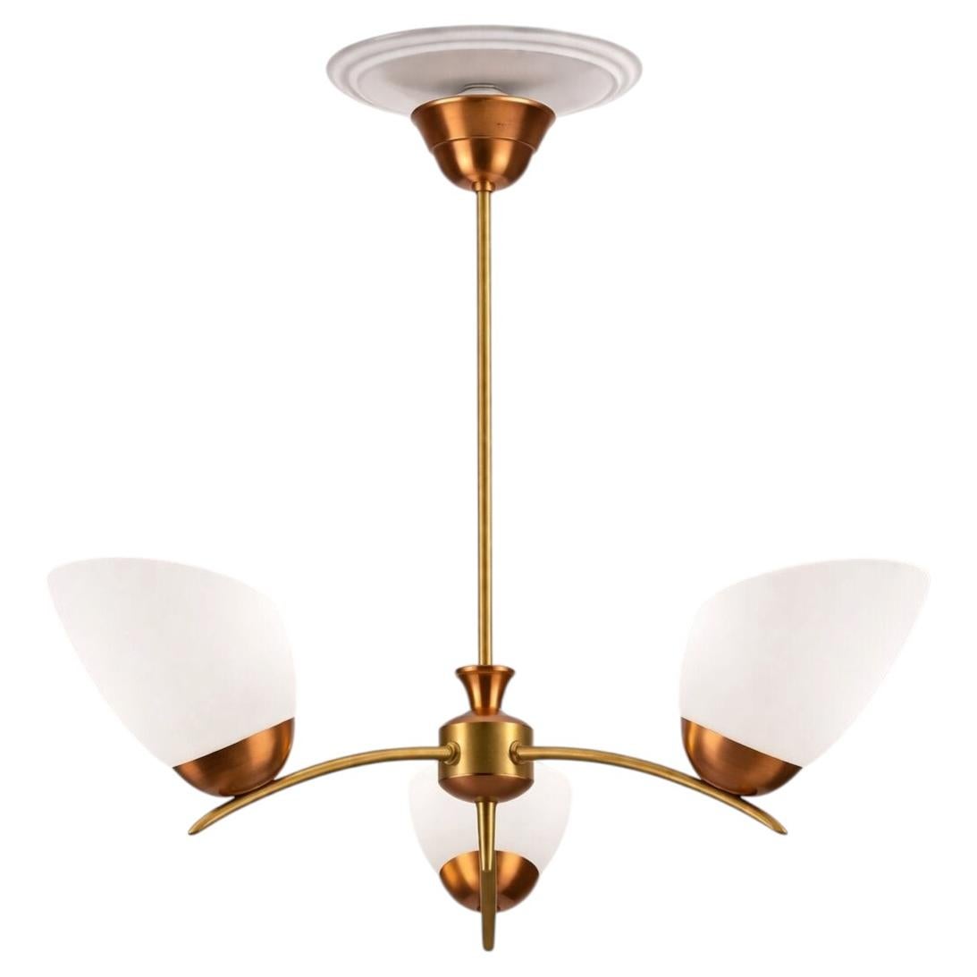 How high should a chandelier be from the table?