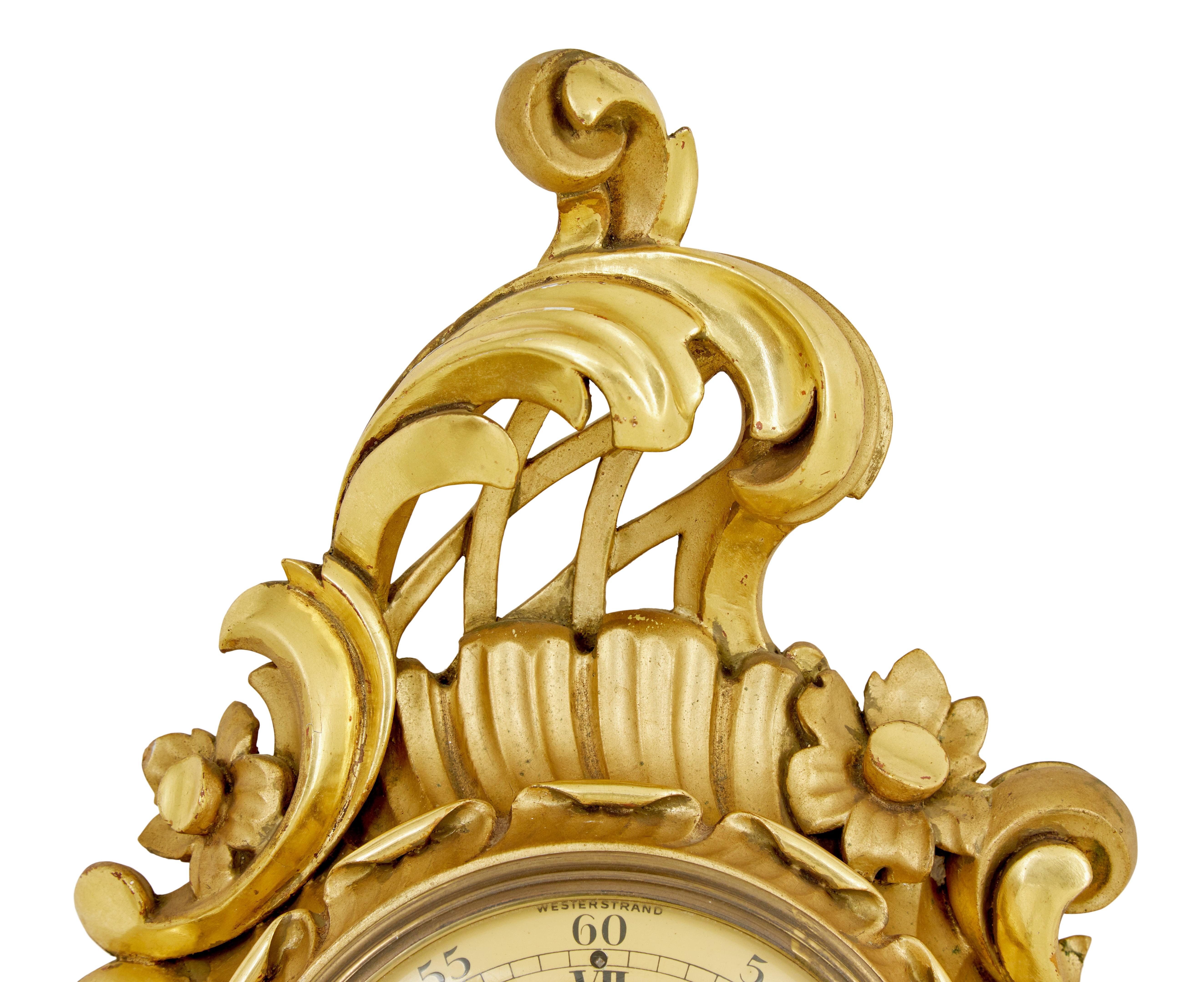 Rococo Swedish mid century carved rococo revival gilt clock For Sale