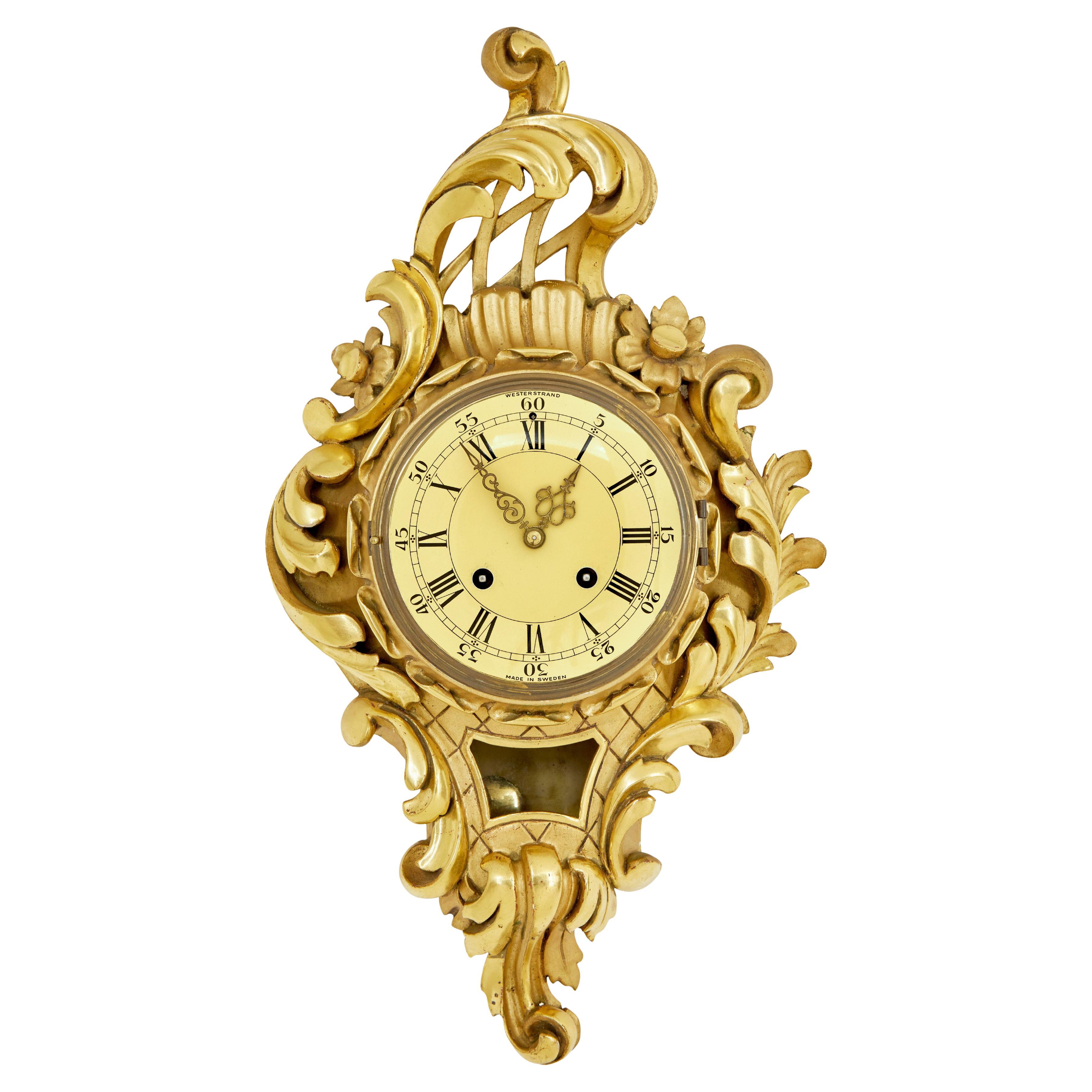 Swedish mid century carved rococo revival gilt clock For Sale