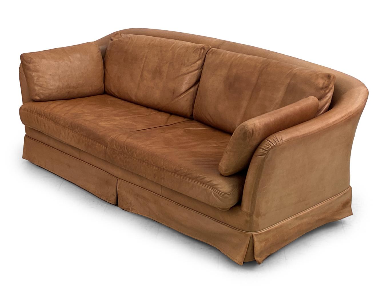 Embrace the pinnacle of Scandinavian luxury with this sumptuous Swedish Mid-Century DUX Brown Leather Sofa. Echoing an era when meticulous craftsmanship met sophisticated design, this sofa stands as a testament to timeless elegance and unparalleled