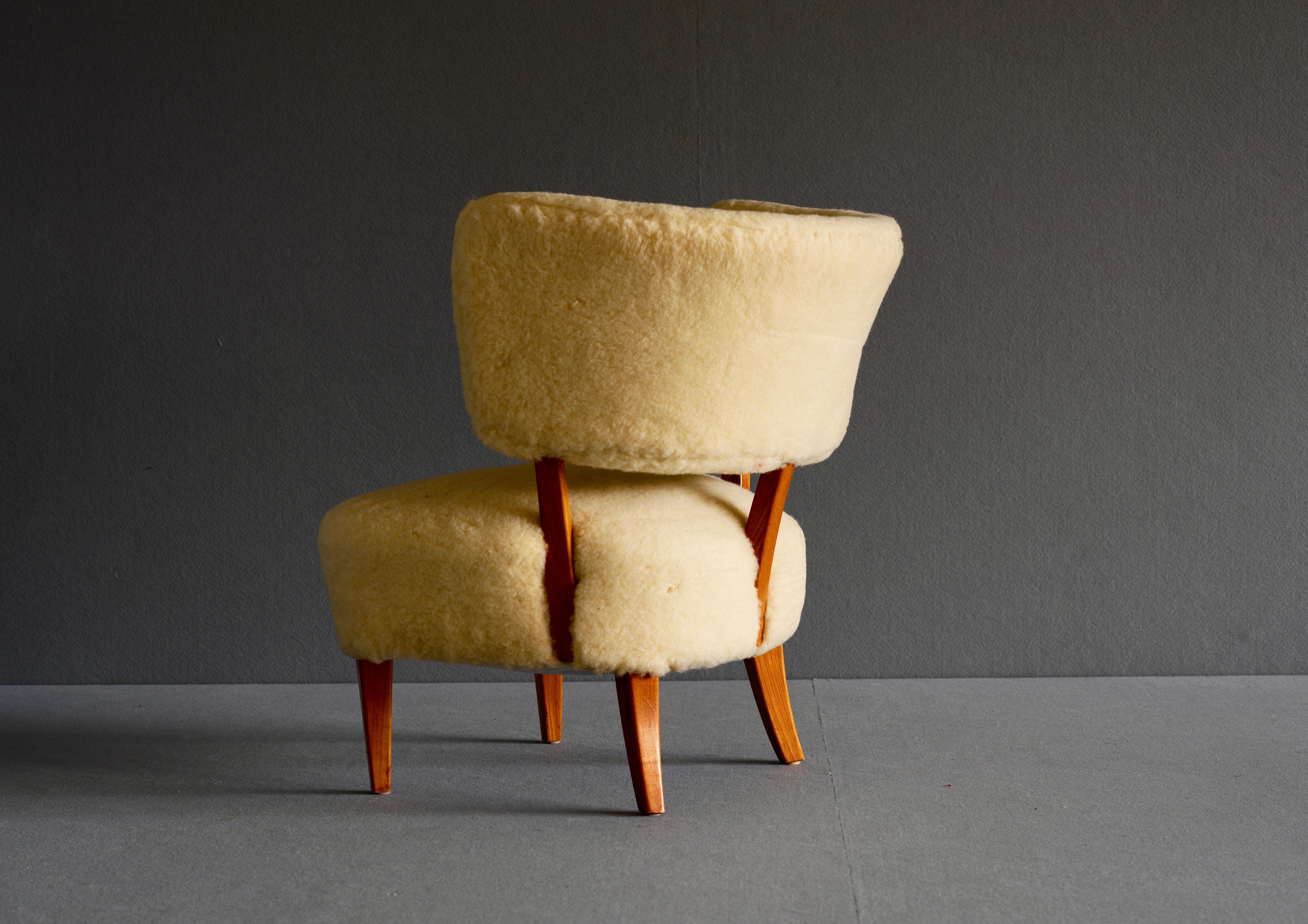 Mid-Century Modern Swedish Mid Century Easy Chair in Sheepskin For Sale