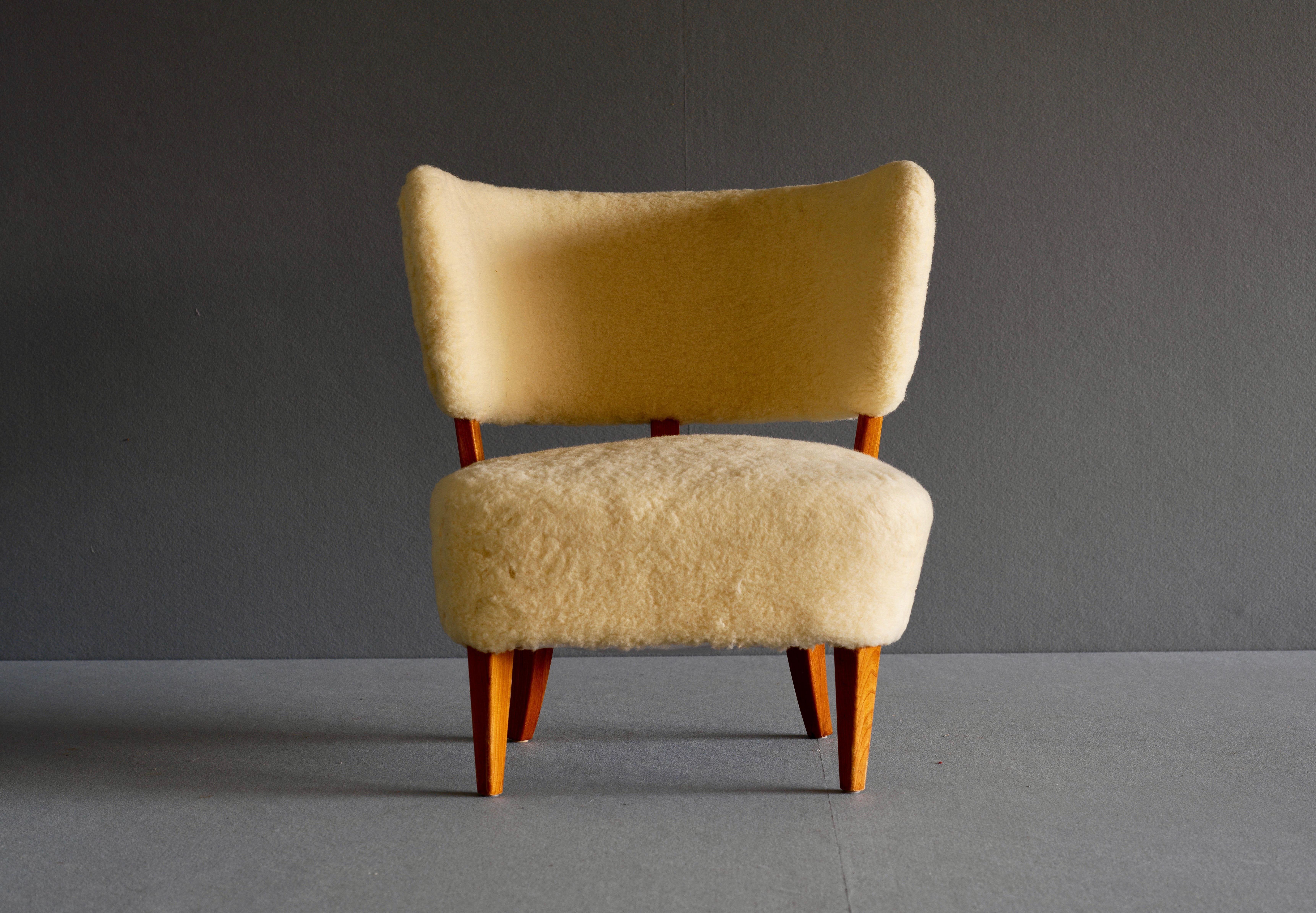 20th Century Swedish Mid Century Easy Chair in Sheepskin For Sale