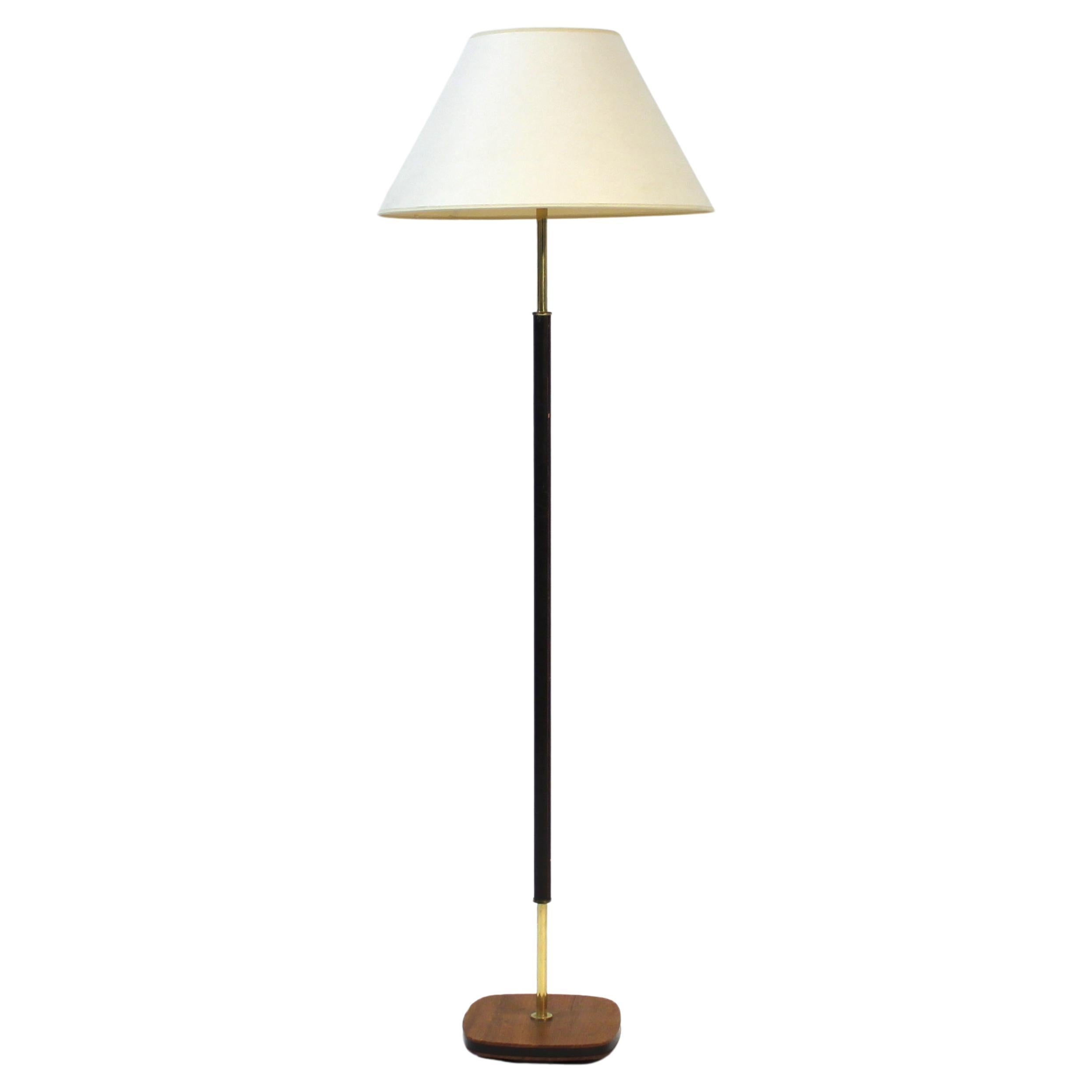Swedish mid-century floor lamp in teak, brass and leather, 1960s For Sale