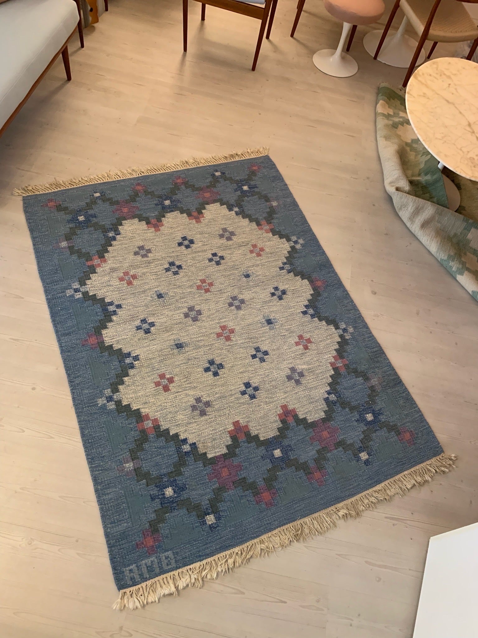 * Mid century carpet designed by Anne-Marie Boberg
* Signed with the initials AMB
* Produced in Sweden 1950's
* Hand woven in wool 
* Mid century, Scandinavian 
* Good vintage condition, with minor signs of usage
* Dimensions (W x D): 200 x