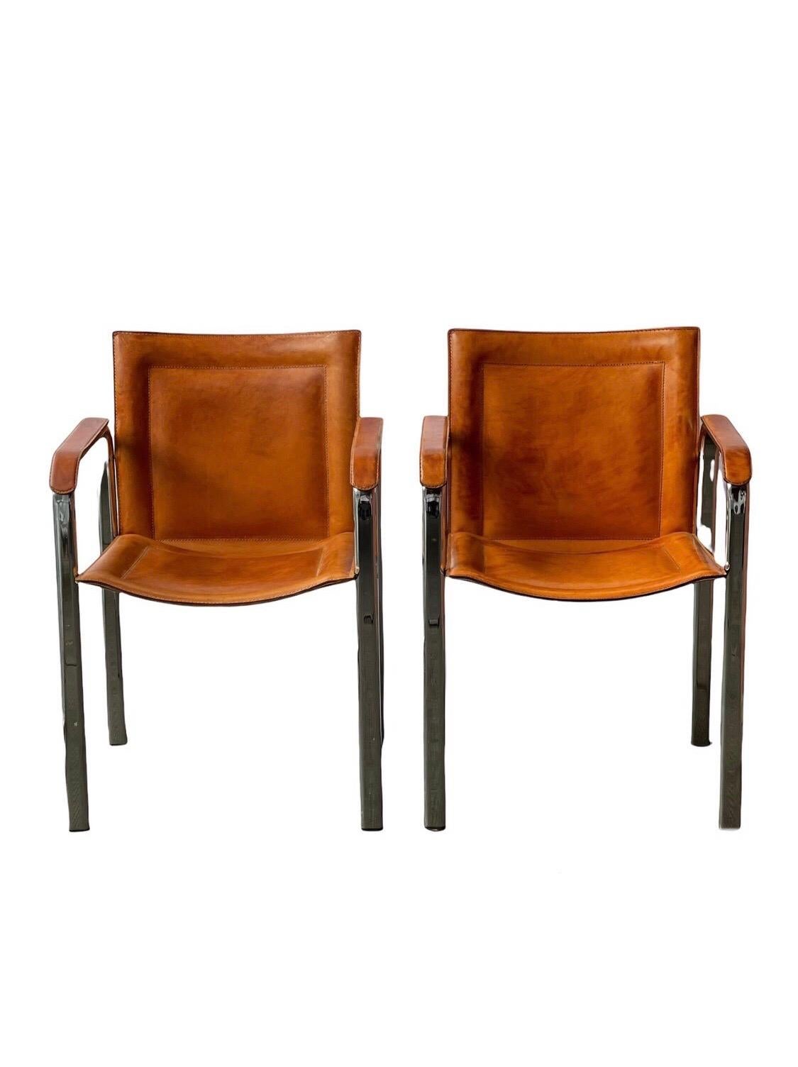 Beautiful Swedish Mid-Century Modern leather chair. The chair has a thick cognac brown leather upholstery and a chrome steel frame. The leather is in excellent vintage condition with just the right amount of patina