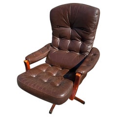 Swedish Mid Century Modern Leather Tufted Swivel Adjustable Armchair