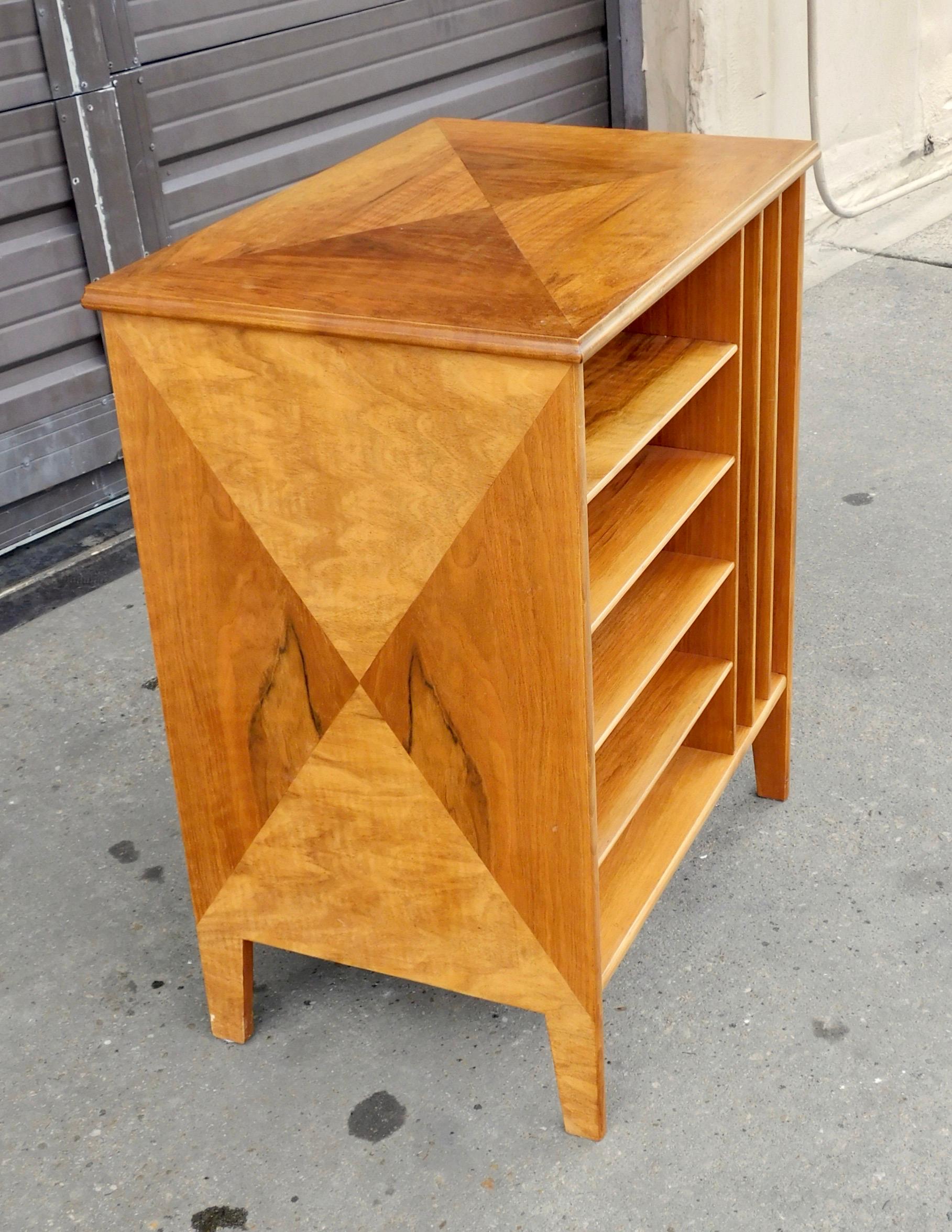 Swedish Mid-Century Modern open shelved filing cabinet rendered in parquetry inlaid walnut. In great original condition with some original age patina. All wood joinery is totally stabile. Finish is in good condition. Ready to give you a lifetime of