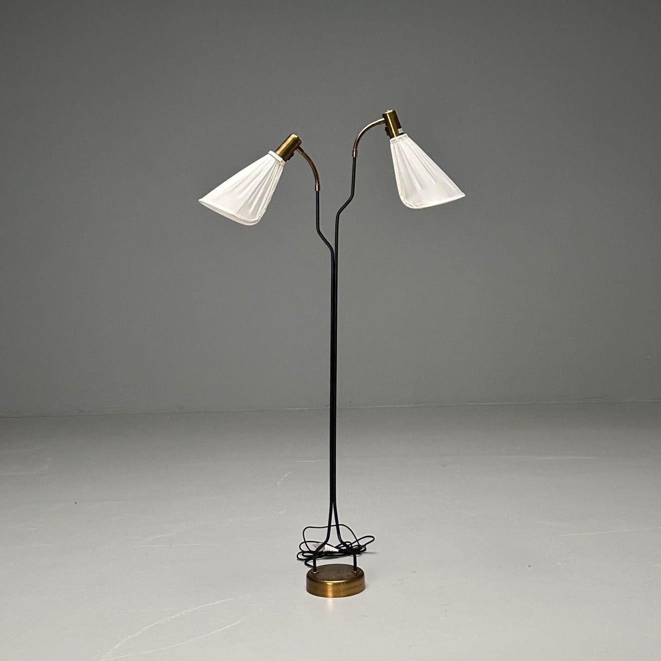 Swedish Mid-Century Modern, Organic Floor Lamp, Black Lacquer, Sweden, 2000s

Swedish modern floor lamp designed and produced in the 20th century. This example features a black lacquered metal neck, a brass brass, and two adjustable lamp heads with