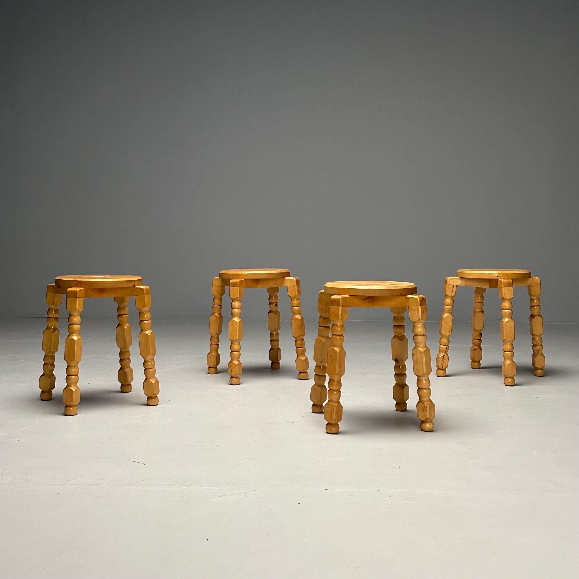 Swedish Mid-Century Modern, Two Footstools, Birch, Sweden, 1960s

Two birch stools designed and produced in Sweden in the later half of the 20th century. Each stool has four playfully carved slightly tilted legs. Wood doweling throughout indicative