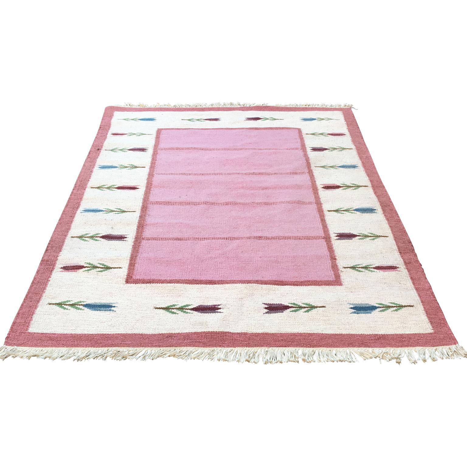 A Mid-Century Modern vintage handmade Swedish carpet in wool with a flower geometric pattern. The tradition of quality handwoven rolakan carpets and rug is really showing up in this piece.