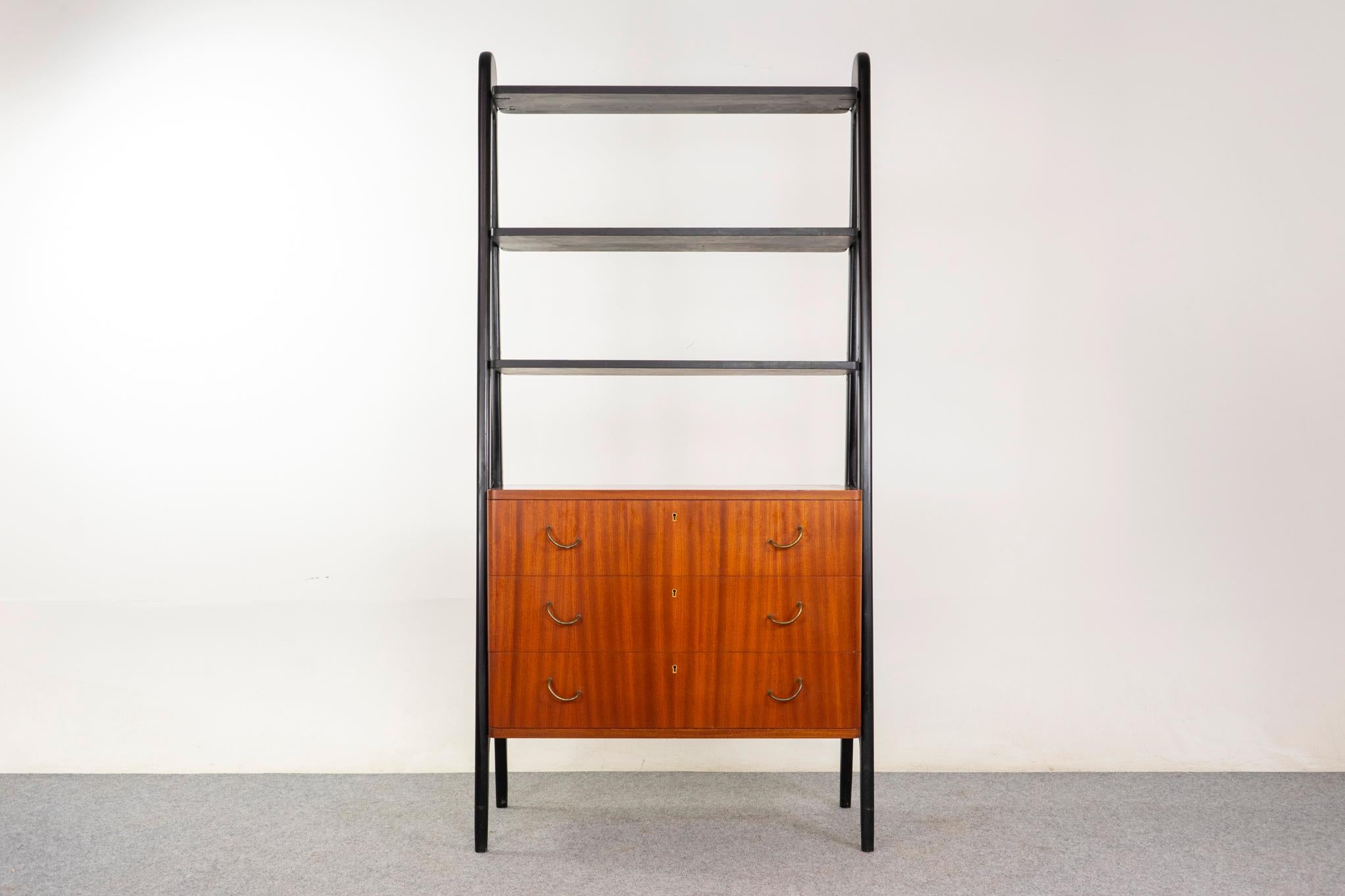 Mahogany Swedish bookcase, circa 1960s. Striking silhouette and loads of charm! Chest of drawers with jaunty angled handles and lovely grain match up on the drawer faces, all lockable too! Contrasting jet black open bookshelf, 2 height-adjustable