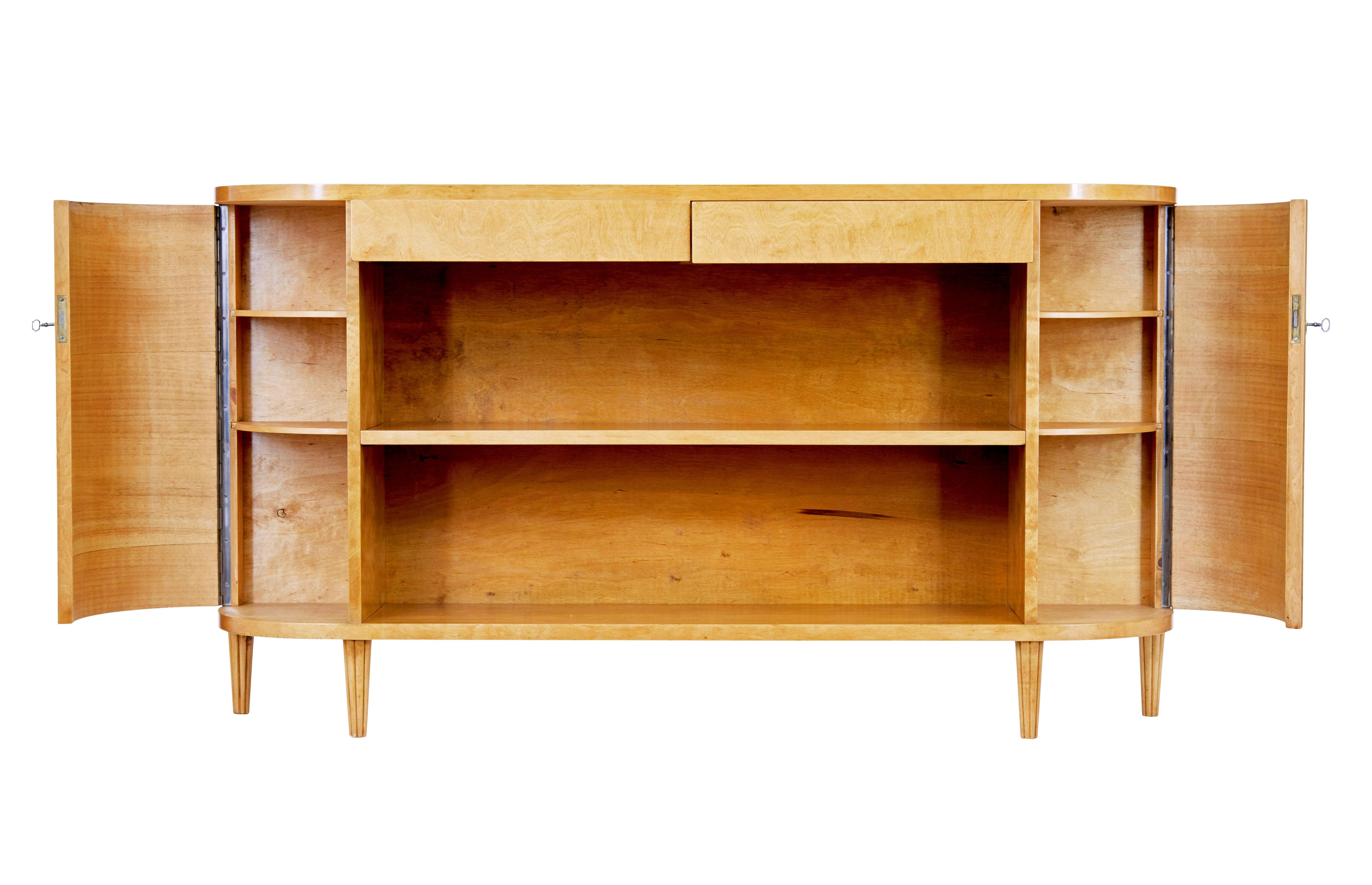 Hand-Crafted Swedish mid century shaped low open bookcase