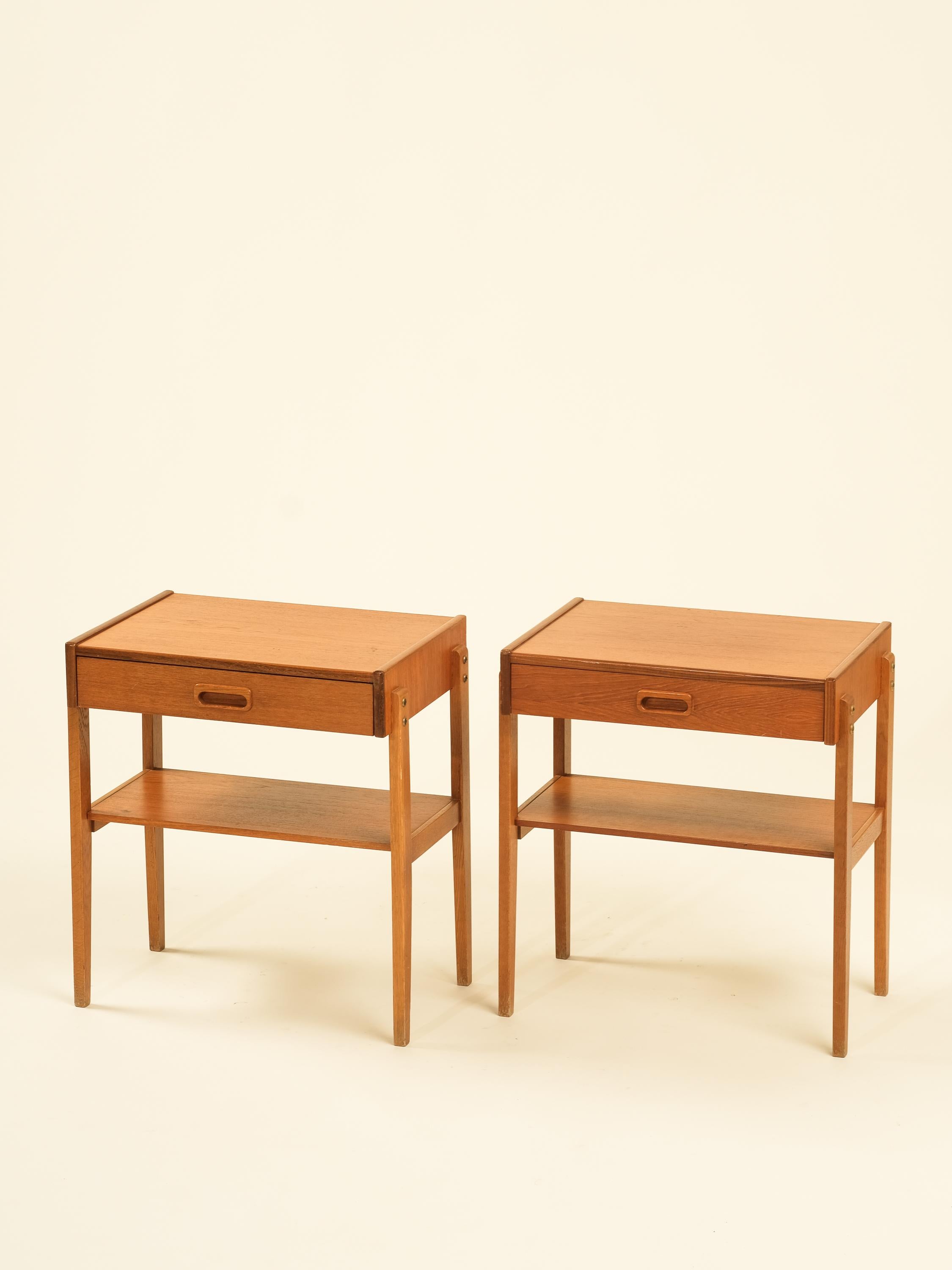 Stylish and sophisticated Swedish mid-century teak & oak bedside tables from the 1960s. Crafted with premium materials, these bedside tables offer both functionality and elegance.