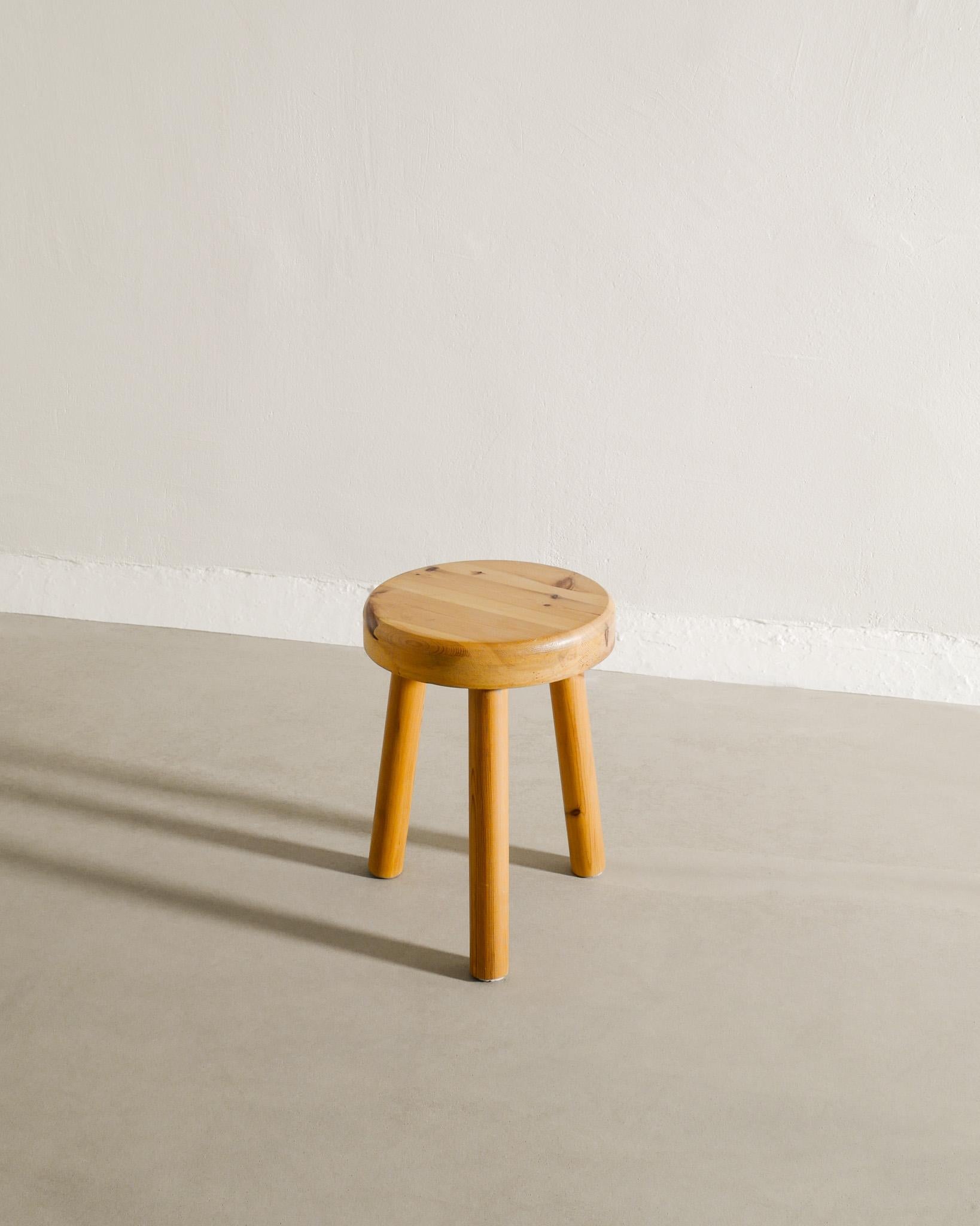 Rare wooden mid century three legged low stool in pine produced in Sweden 1960s. In good original condition. Stamped 