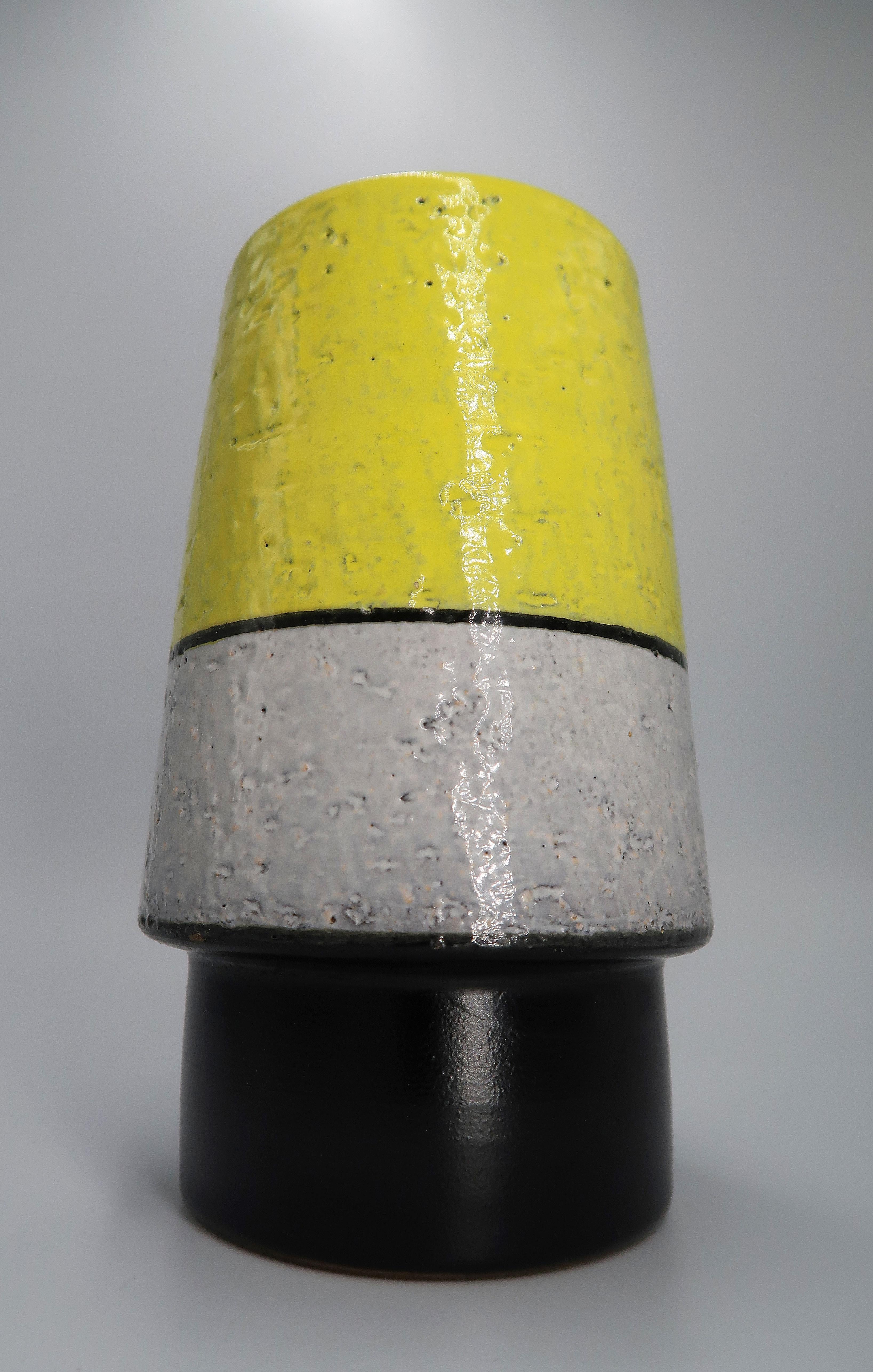 Stunning bright yellow, warm grey and smooth black Swedish Mid-Century Modern ceramic vase by designer Mari Simmulson. Manufactured by Upsala Ekeby in the 1960s. Signed and stamped under base. Model 431/441. In beautiful condition. 