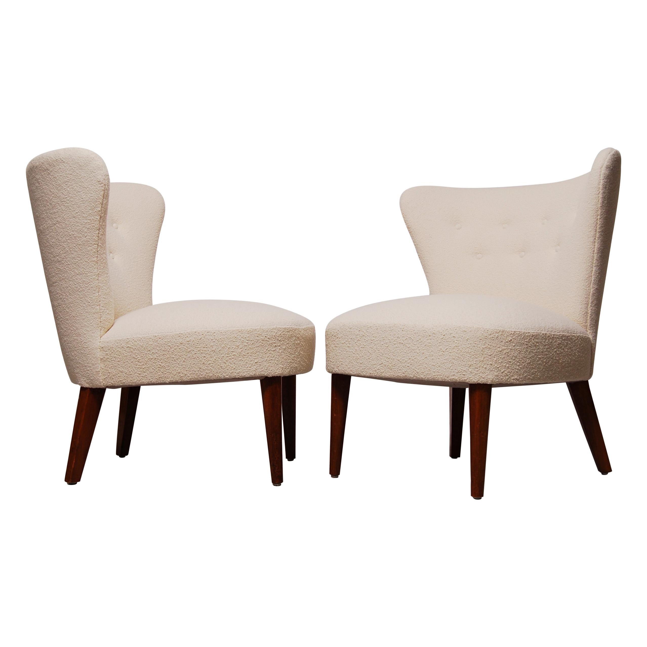 A pair of Scandinavian Modern lounge / cocktail chairs reupholstered in Knoll Classic Pearl Boucle fabric. Excellent condition.
 