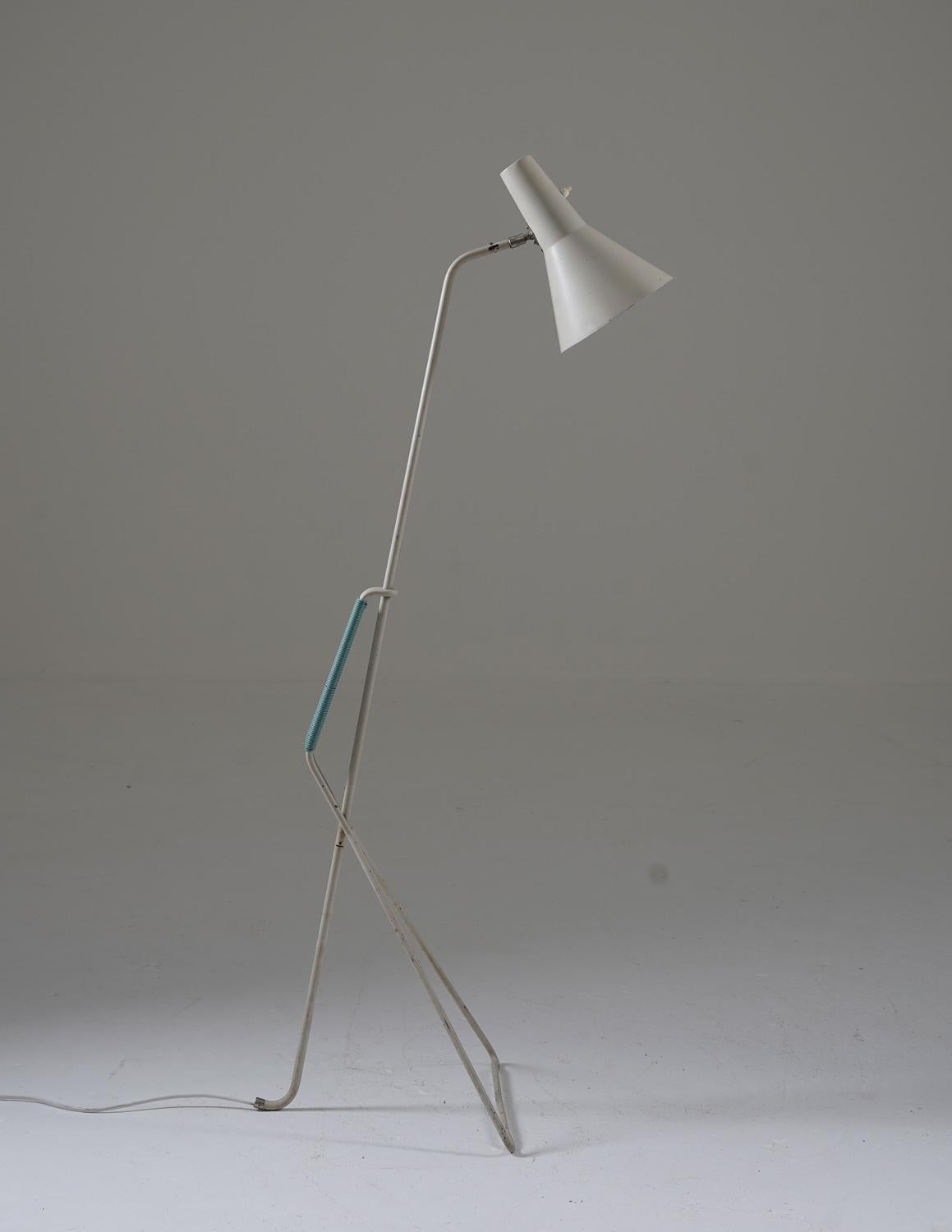 Floor lamp manufactured by ASEA, Sweden, 1950s.
Beautiful floor lamp in original grey lacquer with details in light-blue plastic.

Condition: Fair original condition with patina (stains, marks, minor dents). 
 