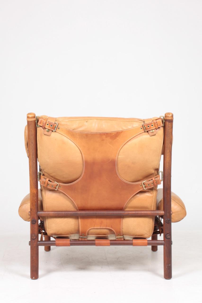 Mid-20th Century Swedish Midcentury Lounge Chair in Patinated Leather by Arne Norell