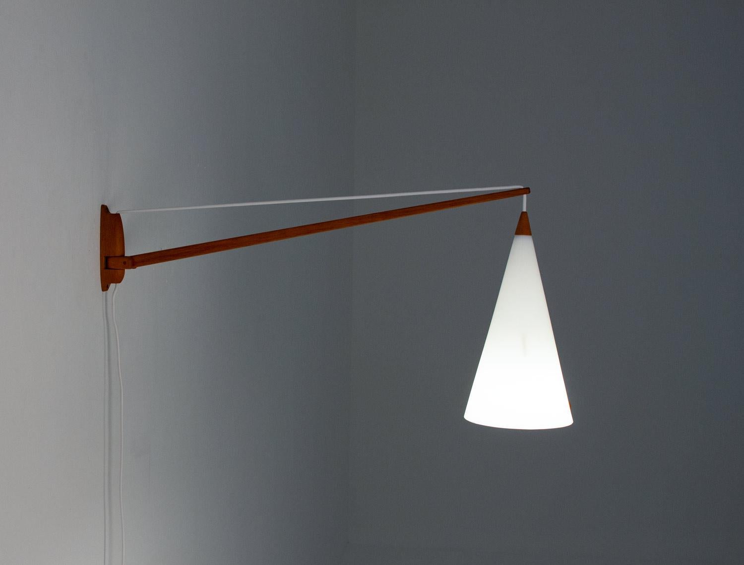 Mid-Century Modern Swedish Midcentury Swiveling Wall Lamp in Acrylic and Teak by Luxus For Sale