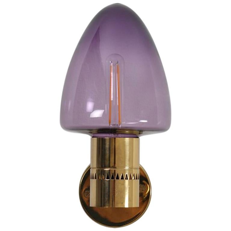 Set of eight wall lights v-220 by Hans-Agne Jakobsson for Markaryd.

Beautiful wall lamps in brass with shades in a rare violet tone. 

Condition: Varying condition.
 
