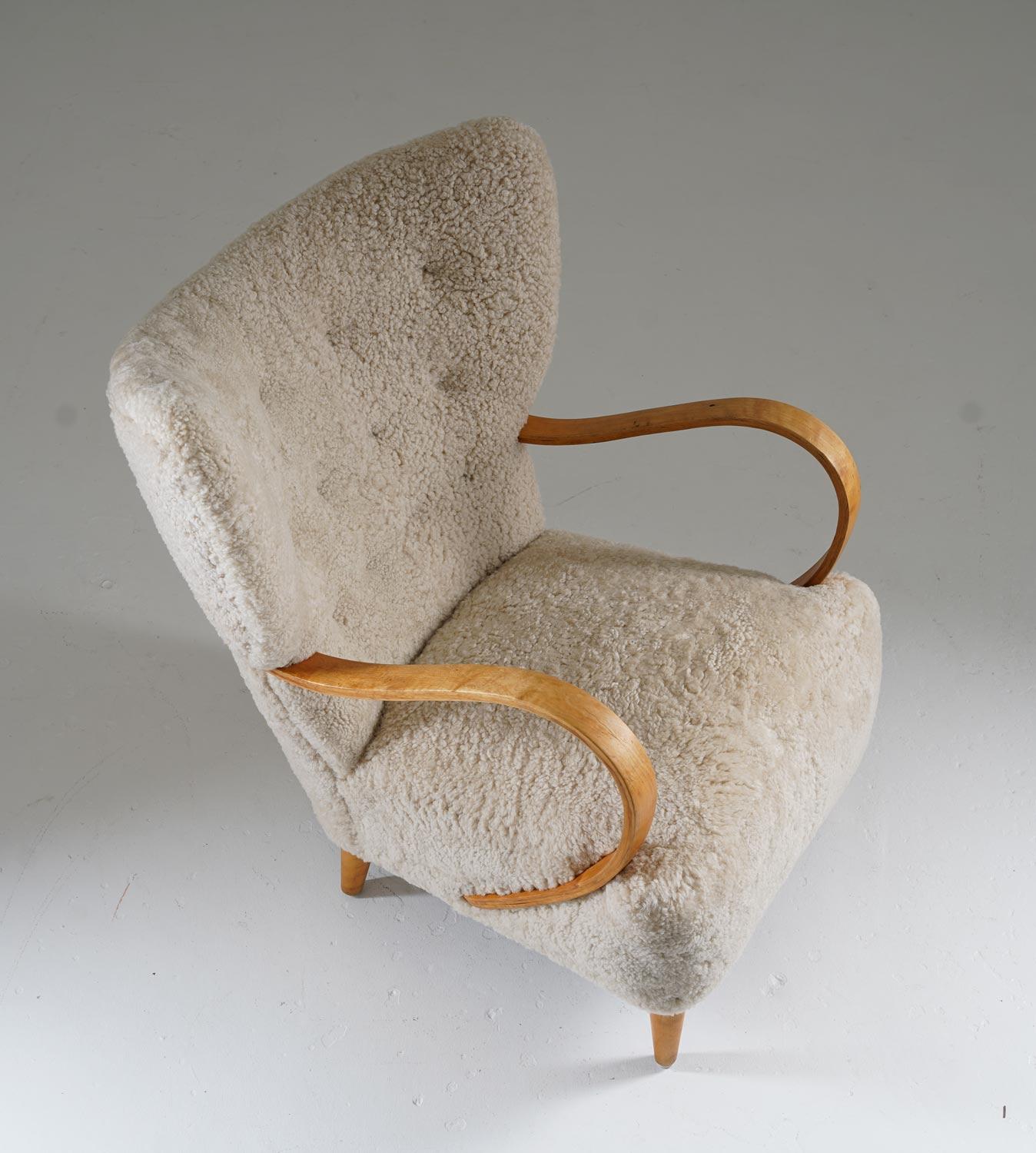 Scandinavian Modern Swedish Midcentury Wingback Lounge Chair in Sheepskin For Sale