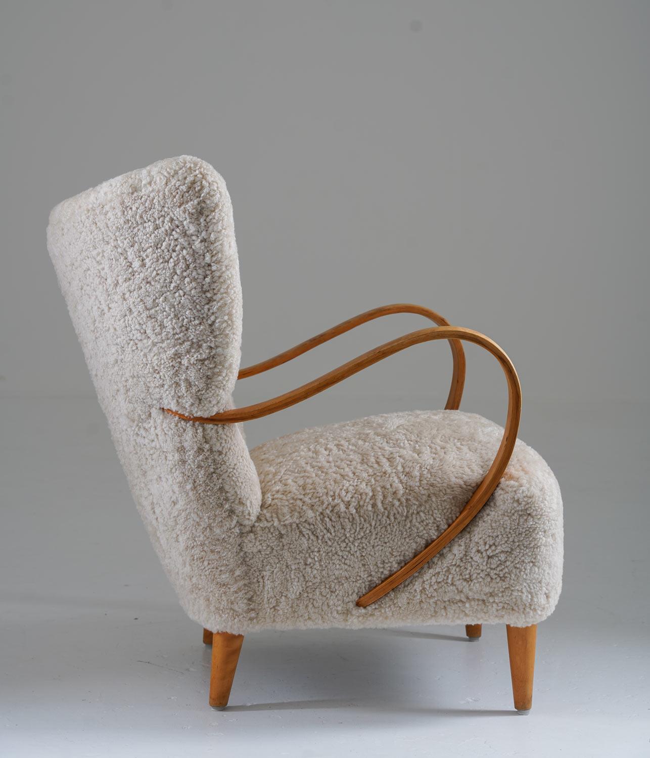 Swedish Midcentury Wingback Lounge Chair in Sheepskin In Good Condition In Karlstad, SE