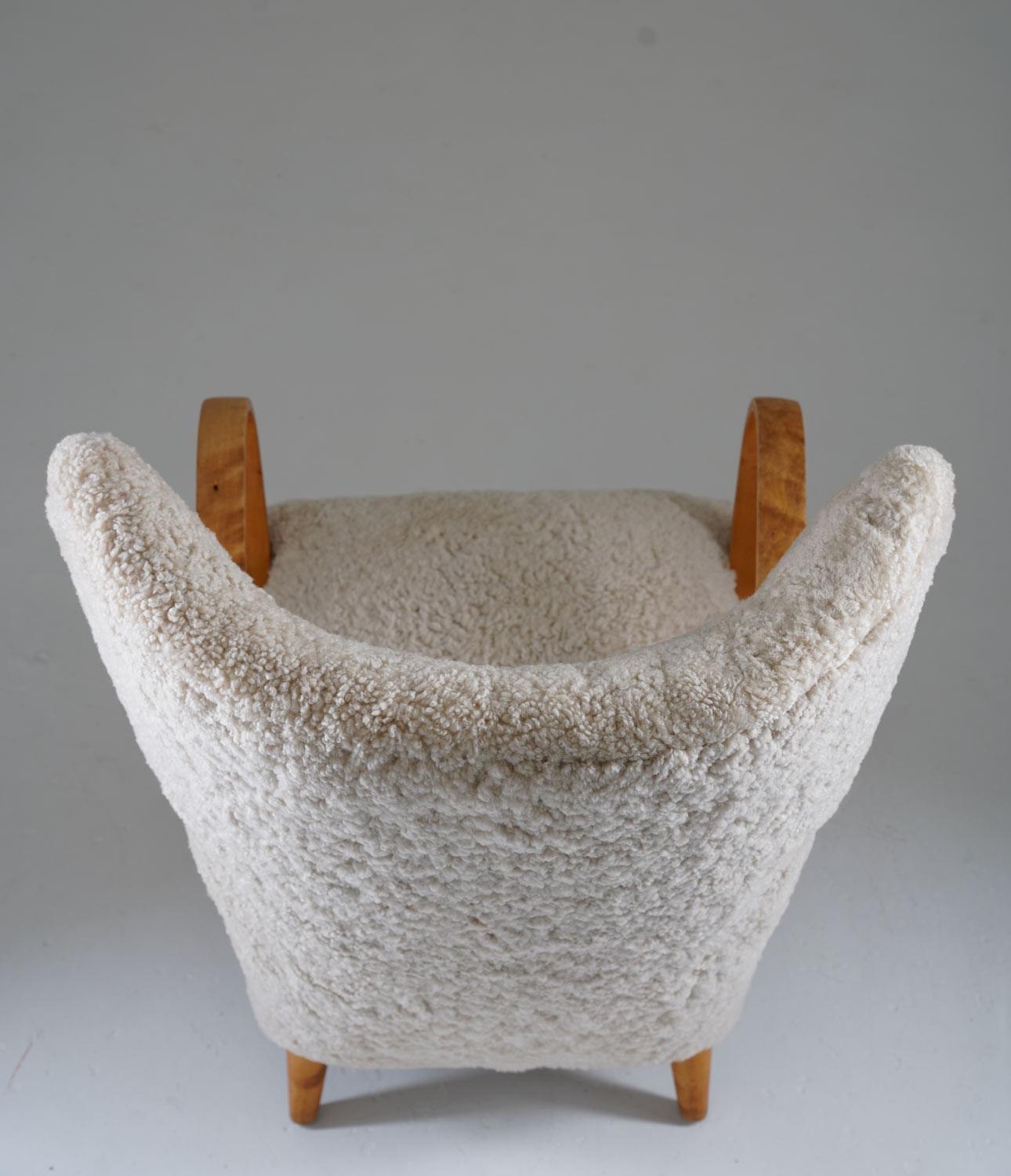 Swedish Midcentury Wingback Lounge Chair in Sheepskin For Sale 2