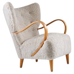 Vintage Swedish Midcentury Wingback Lounge Chair in Sheepskin