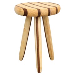 Swedish milking stool in pine and teak by Andreas Zätterqvist