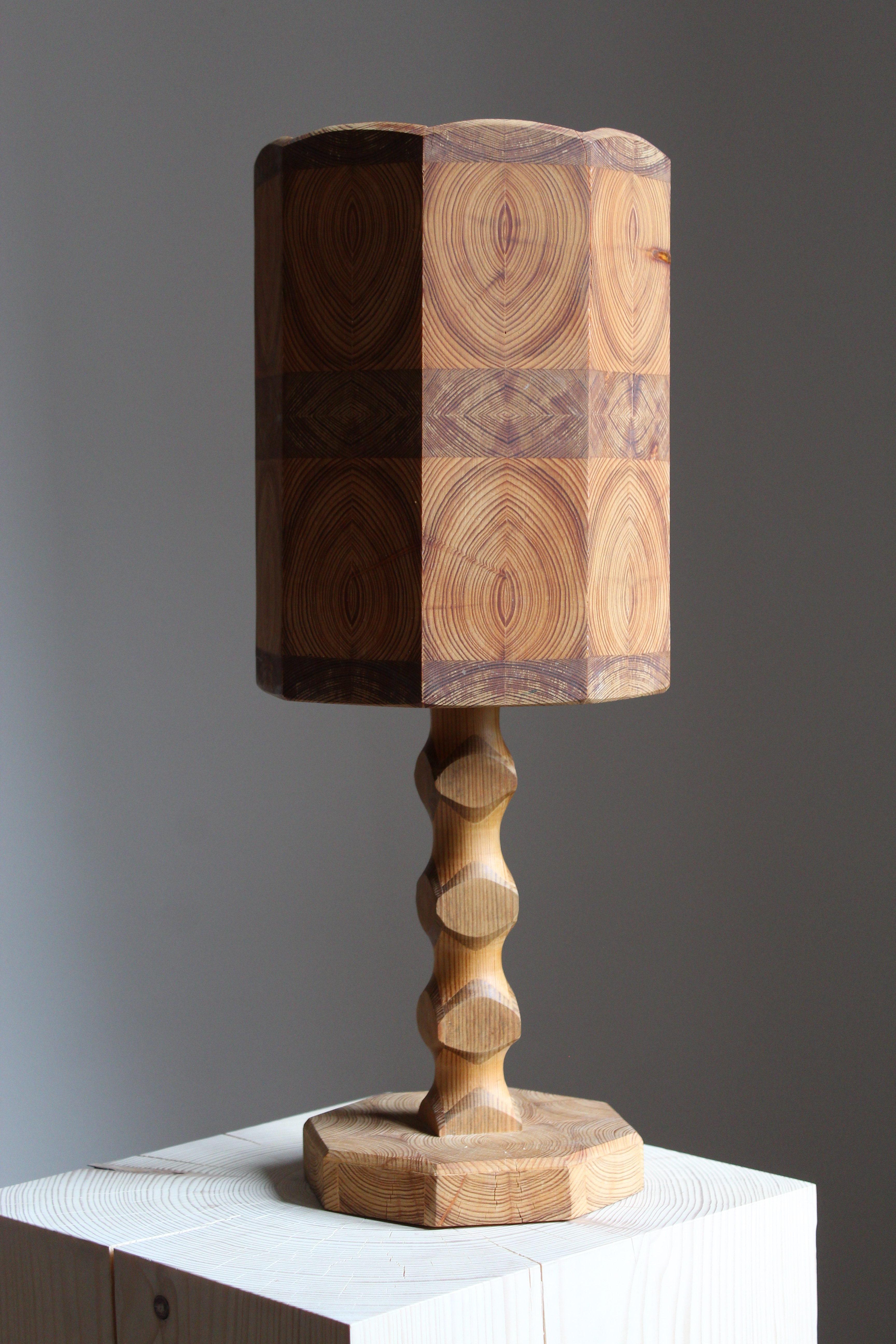 A Swedish craft table lamp. In solid pine, Sweden, 1960s.