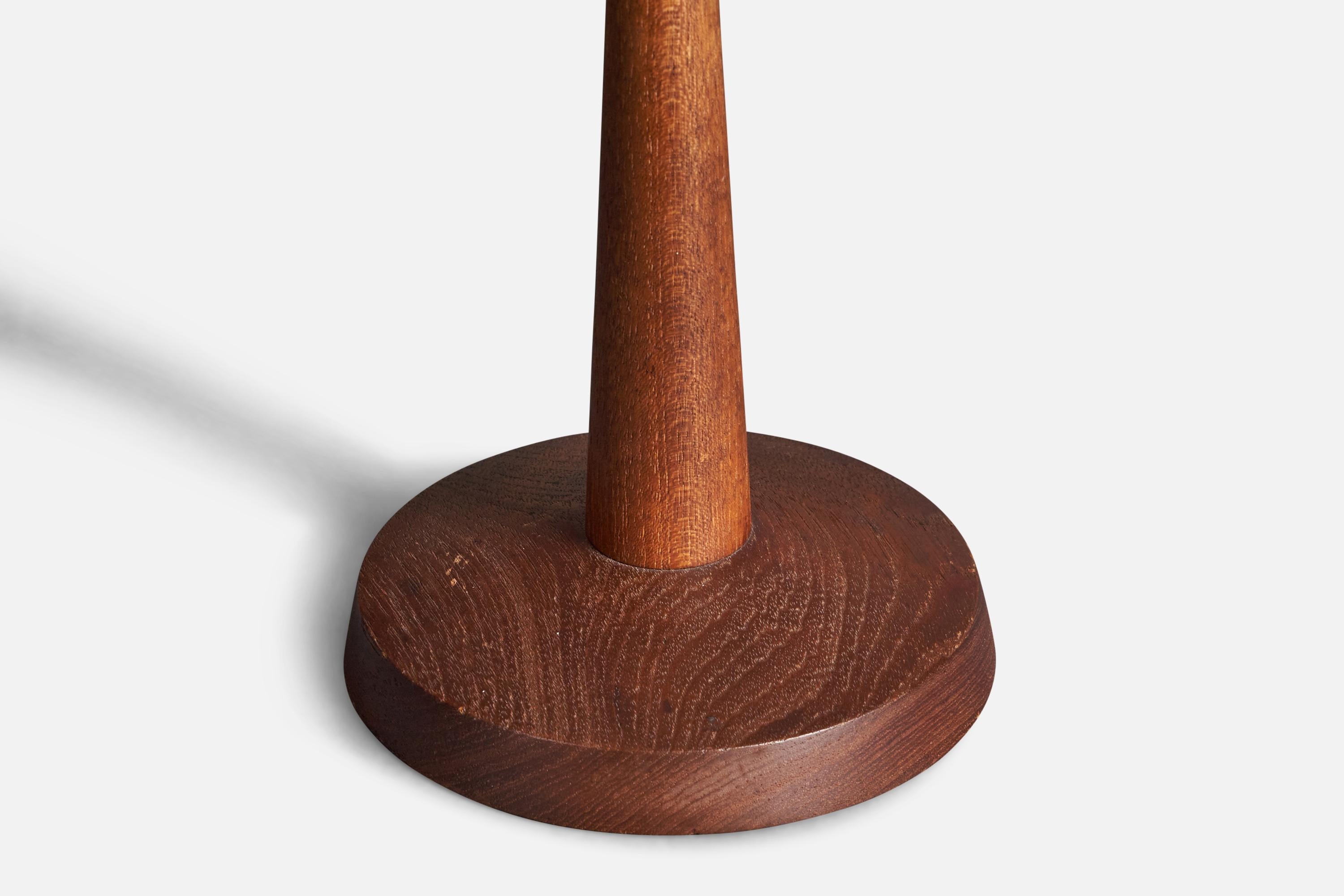 A Swedish craft table lamp. In turned sold teak, Sweden, 1960s.