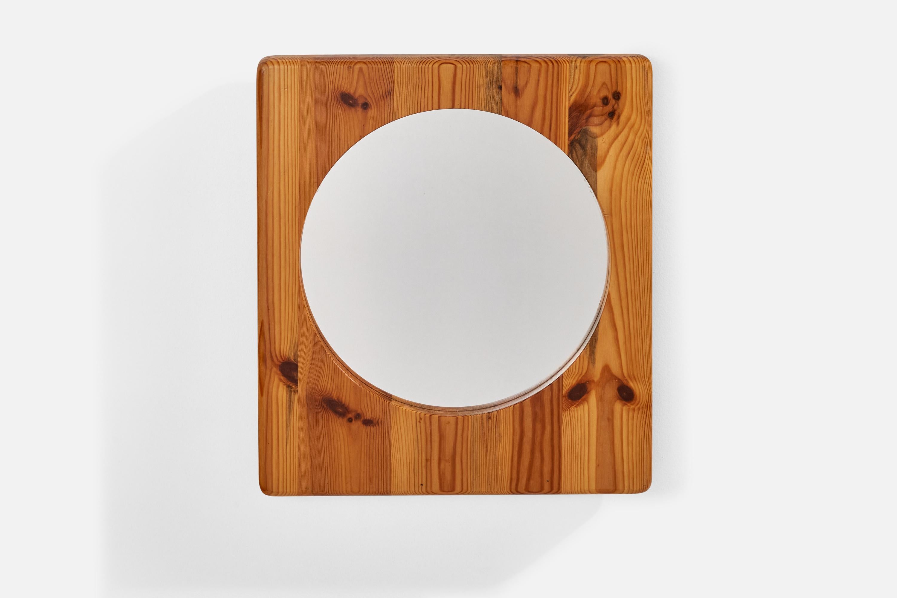 A square wall mirror, frame in solid pine, with it's original mirror glass. Designed and produced in Sweden, 1970s. 

The purity of the form enhances the natural beauty of the material.