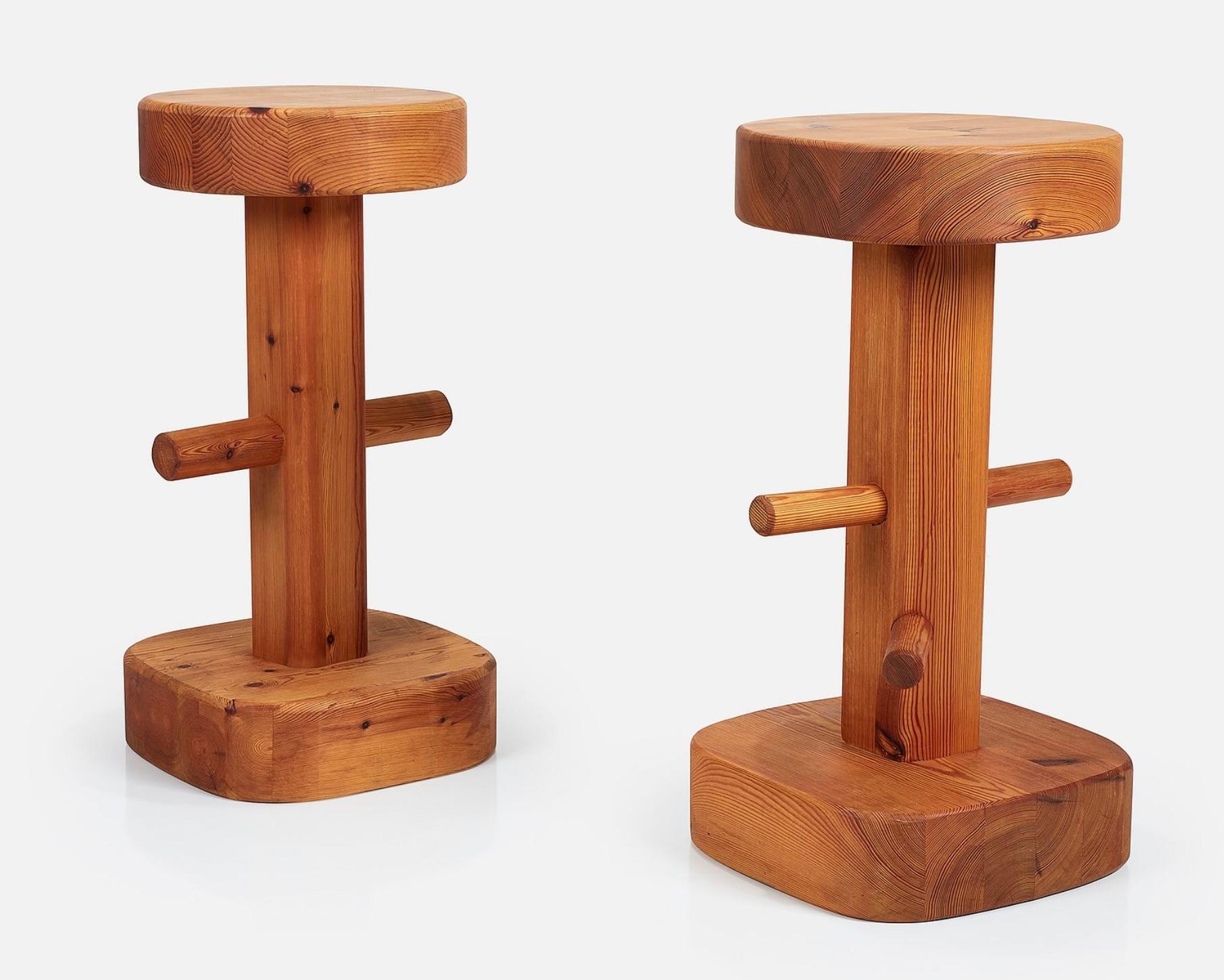 Scandinavian modern stools crafted from select yellow pine in Sweden c1970. These feature excellent craftsmanship and the minimalist style characteristic of Scandinavian furniture. The lacquered patterned pine adds a touch of charm and warmth. On