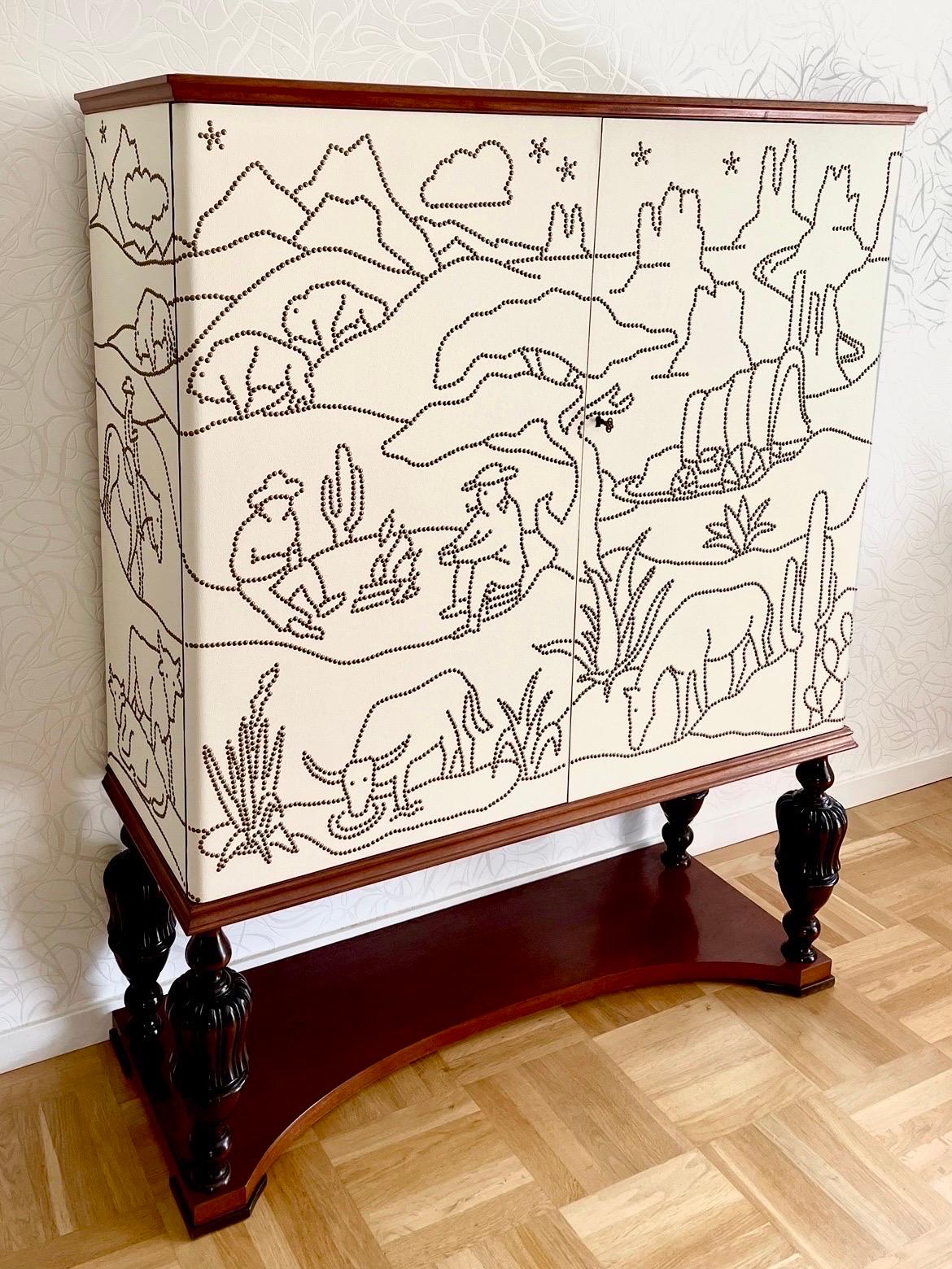 This is the Swedish Modern 1930s cabinet with the newly designed pattern 
“The Emigrants”. 

The 7500 nails Artwork is completed! The inspiration to the pattern 