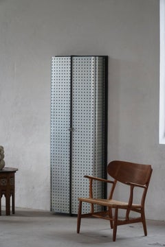 Swedish Modern, A Tall Narrow Cabinet in Steel, Late 20th Century