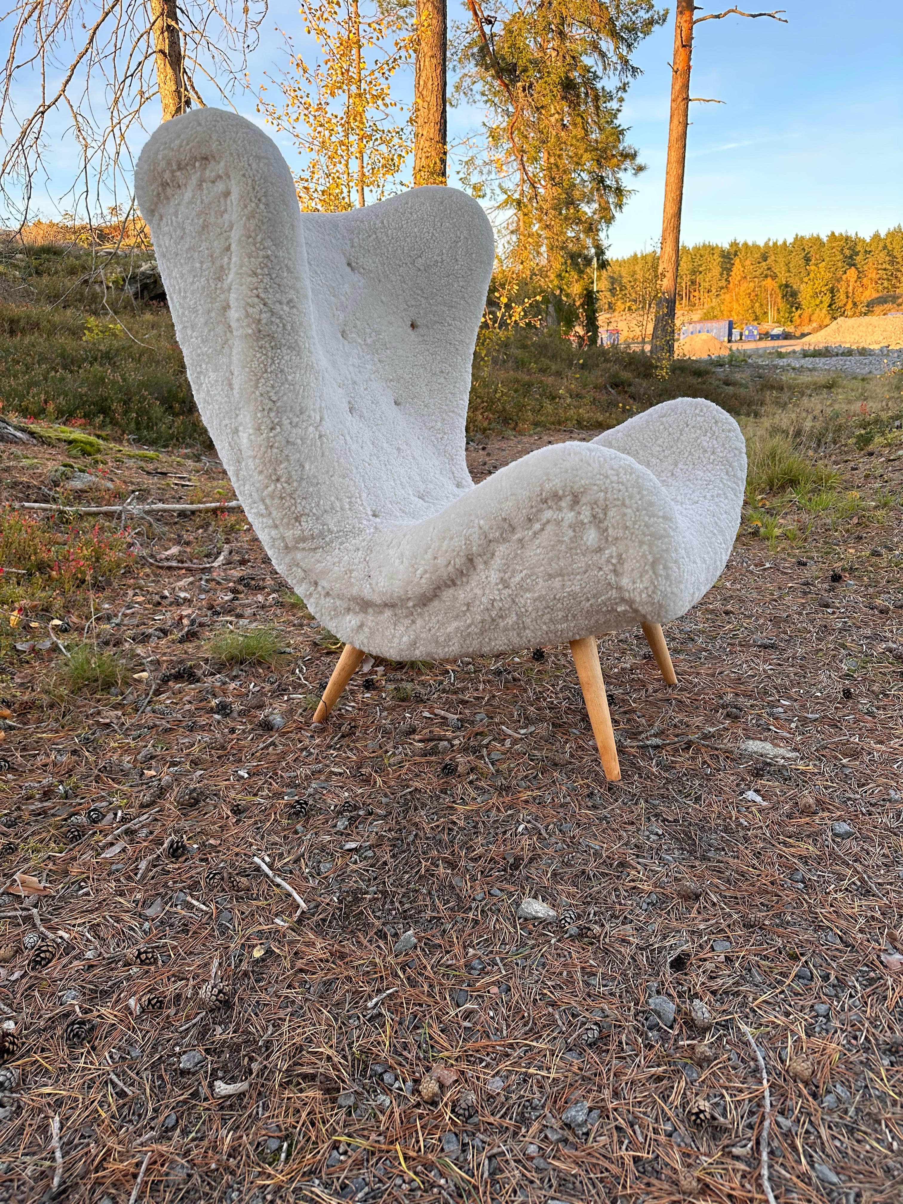 Swedish Modern armchair in sheepskin, 1940-50s 4