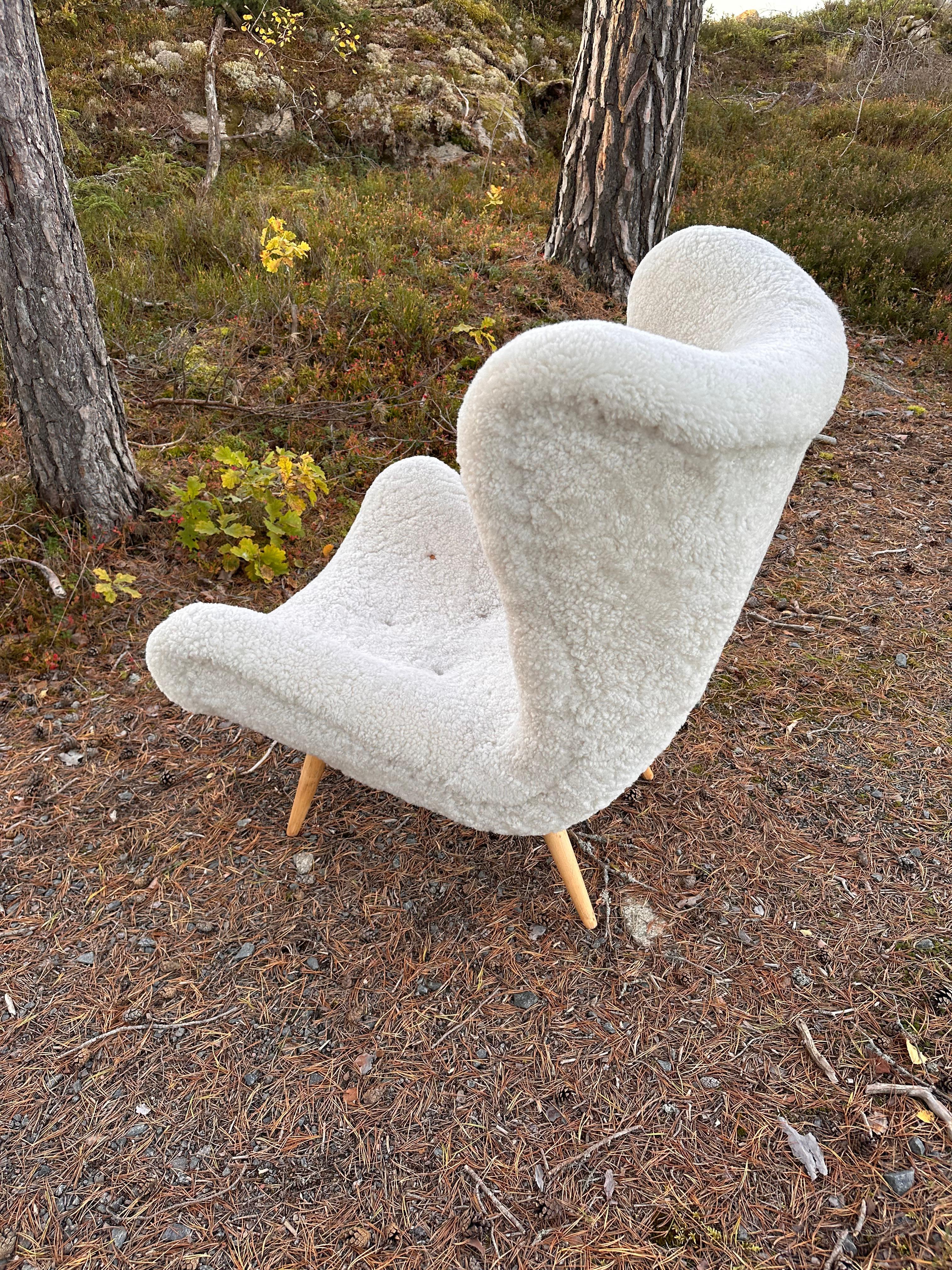 Swedish Modern armchair in sheepskin, 1940-50s 6