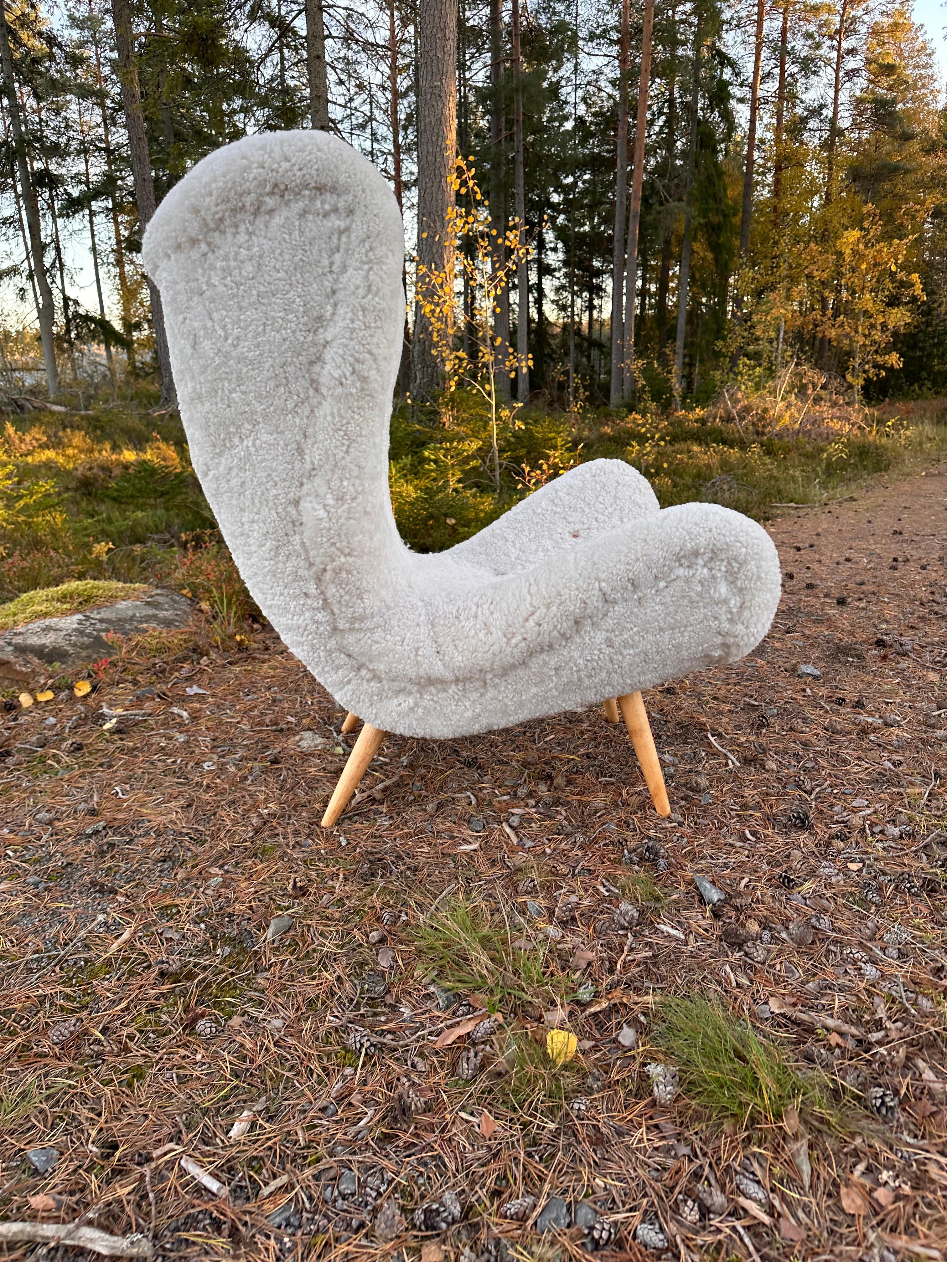 Mid-Century Modern Swedish Modern armchair in sheepskin, 1940-50s For Sale