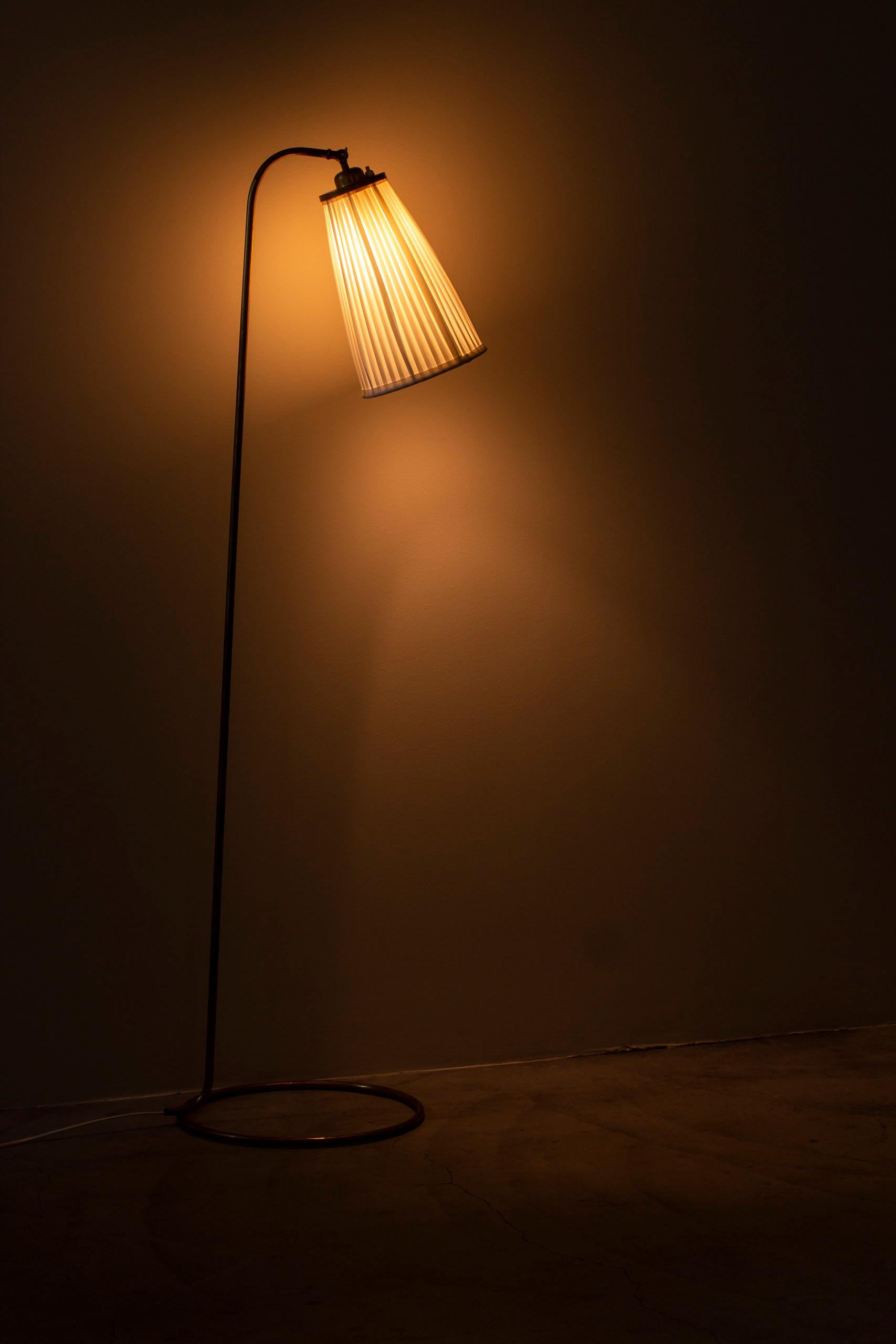 Swedish modern brass and fabric floor lamp from the 1940s 4